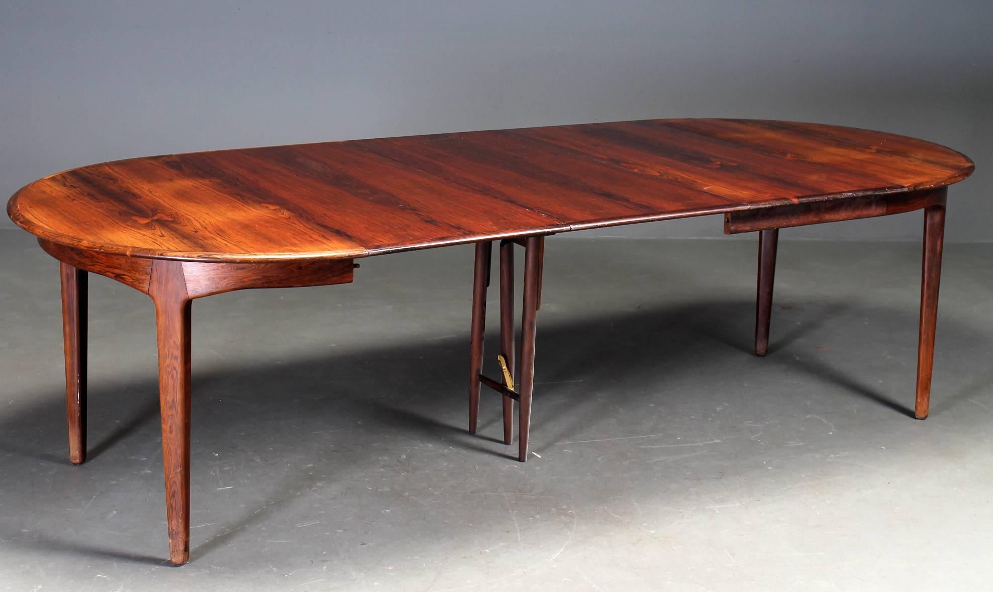 Scandinavian Modern Danish Rosewood Dining Table by Henning Kjaernulf For Sale