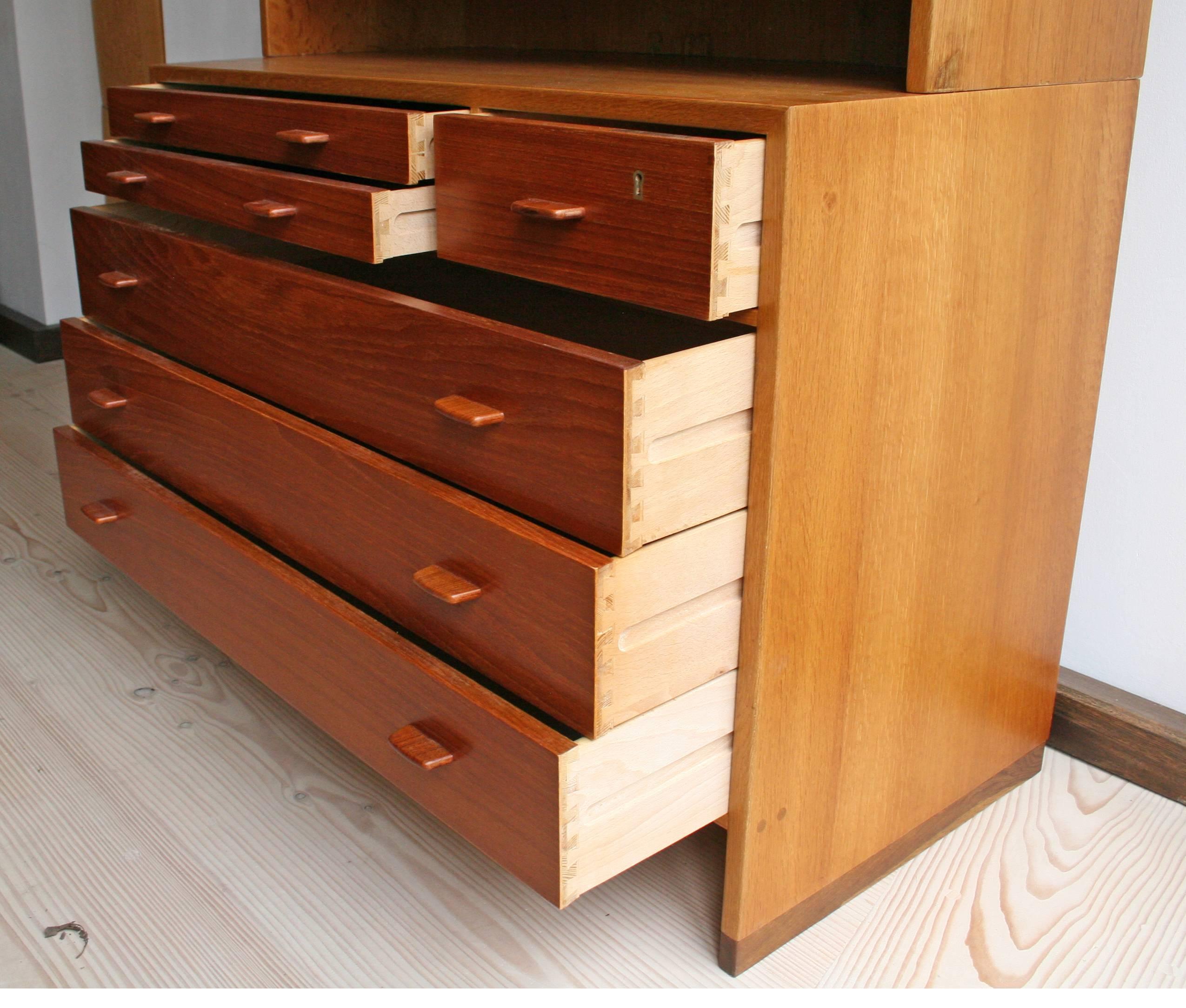 chest of drawers with shelves above