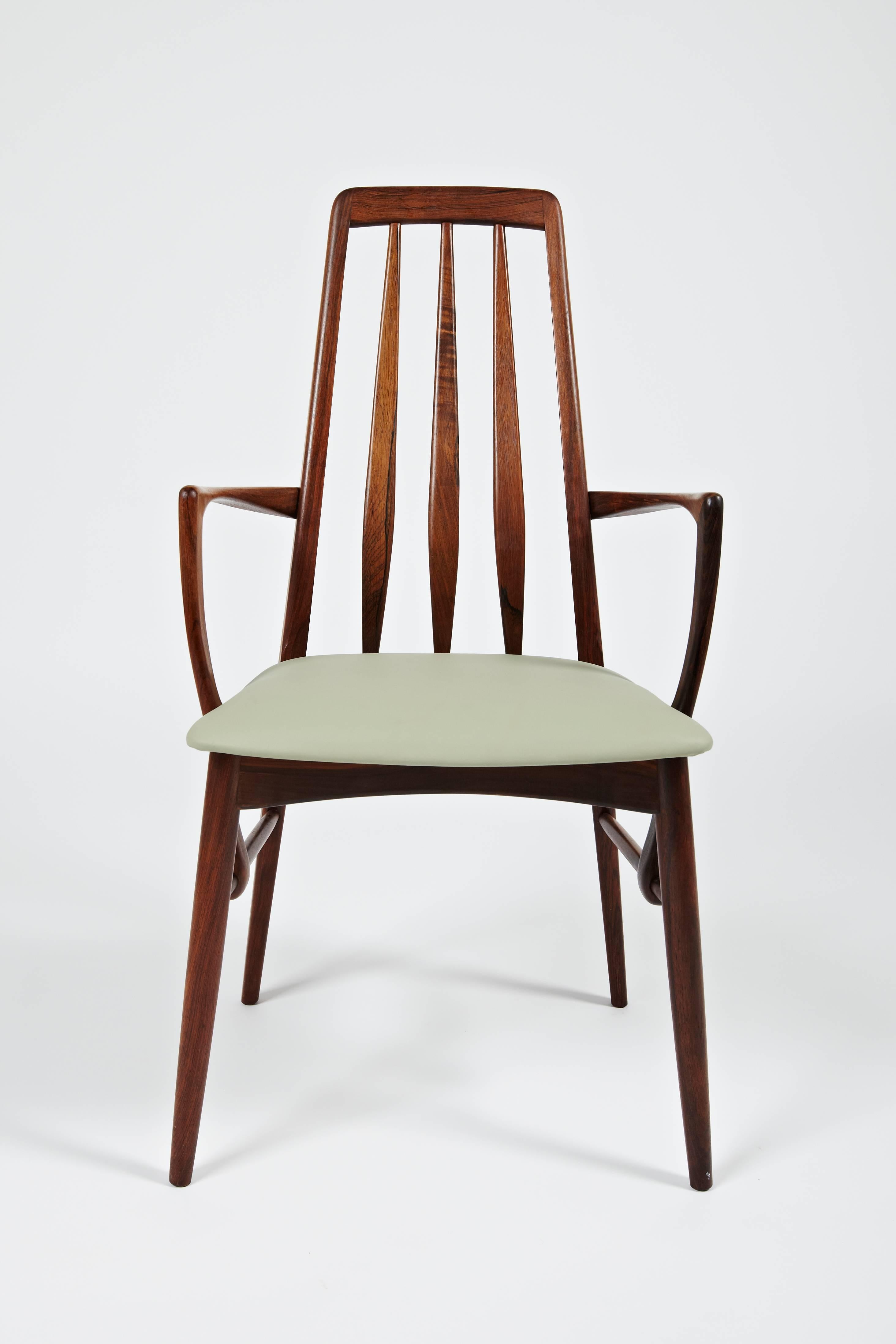 This rosewood dining chair with arms designed in 1964 by Niels Kofoed and made by his brother's workshop Kofoed's Mobelfabrik has had its seat reupholstered in a light green leather.

 