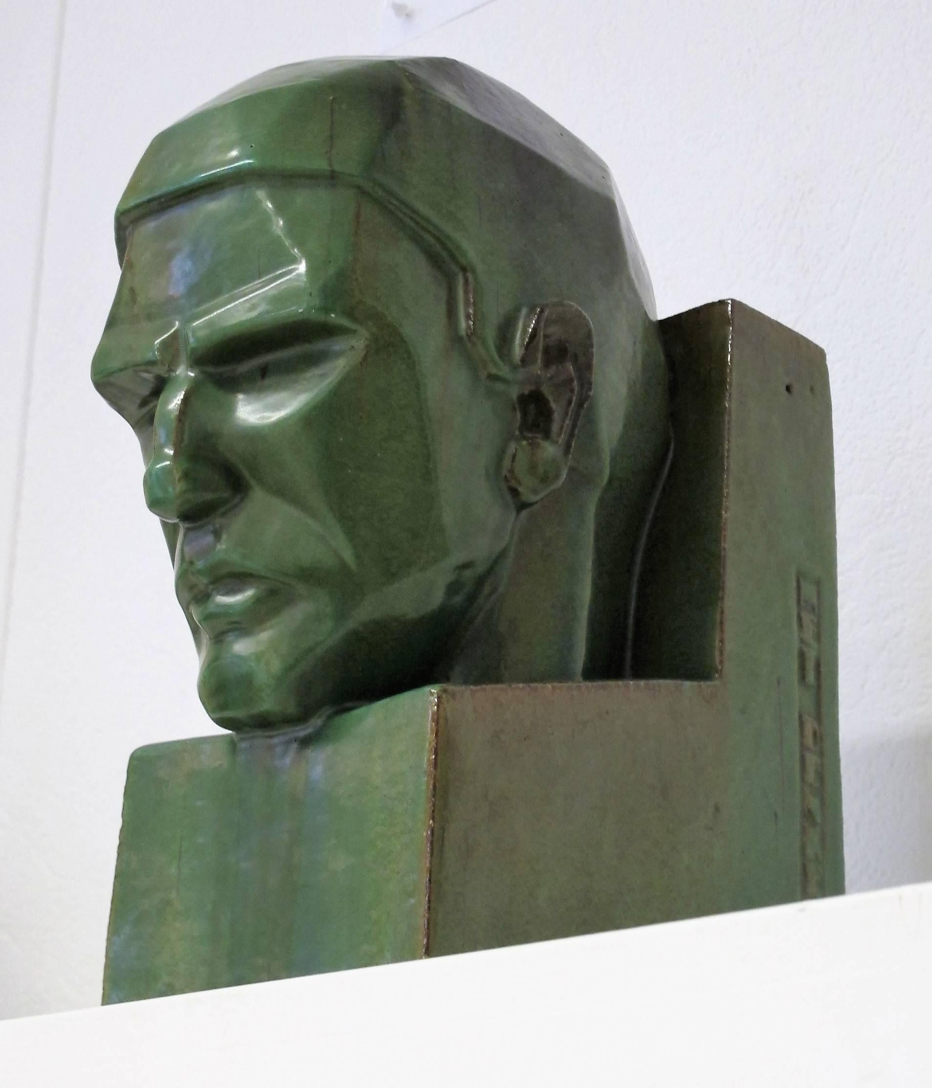 Beautiful deep green glazed earthenware sculpture depicting 'Het Denken' ('Thinking'), designed and executed by Dutch ceramist and sculptor W. C. Brouwer (1877-1933). Brouwer worked as an architectural ceramist as well, for instance for the
