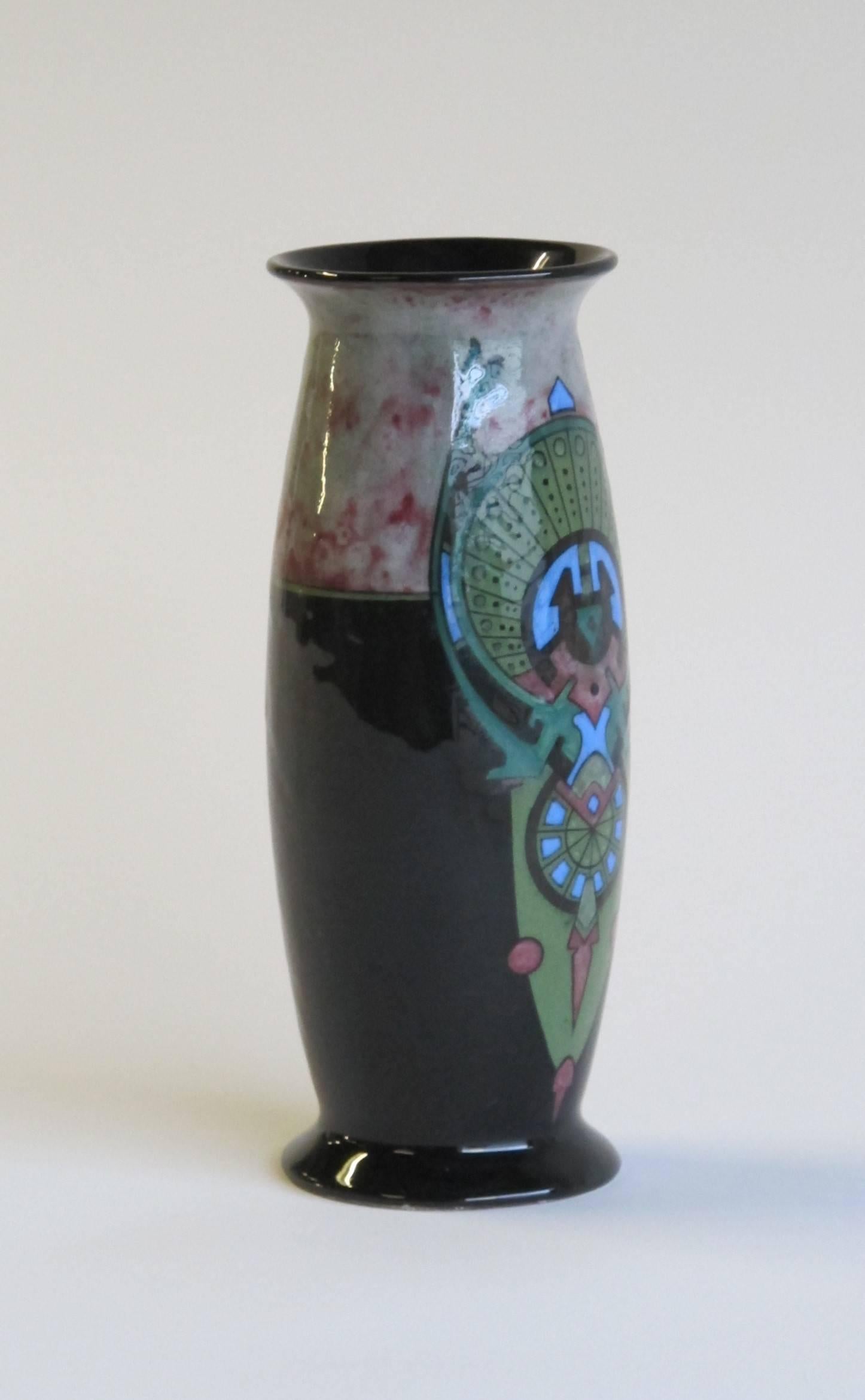 This rare Dutch geometrical Art Nouveau vase was designed by Henri Breetvelt for Porceleinfabriek 'De Kroon' in Noordwijk, the Netherlands, and painted by Jan Ent between 1907 and 1908. The innovative glaze on the back, symmetrical design and