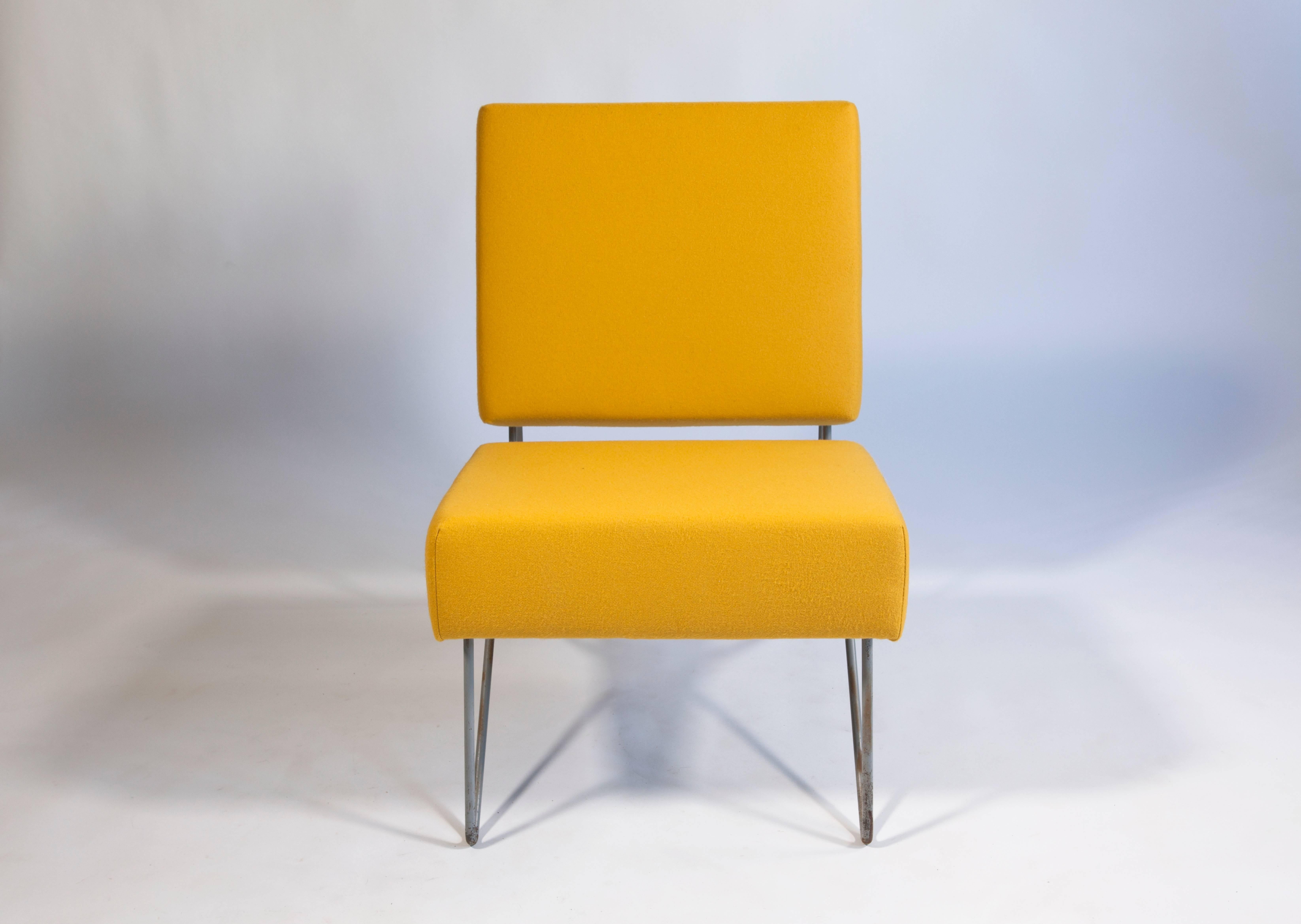 Beautiful Combex chair designed by Cees Braakman for Pastoe in 1954. The number of the model is FM03. The chair has been completely reupholstered with a gorgeous yellow fabric. 

The Dutch designer Cees Braakman (1917-1995) has been very important