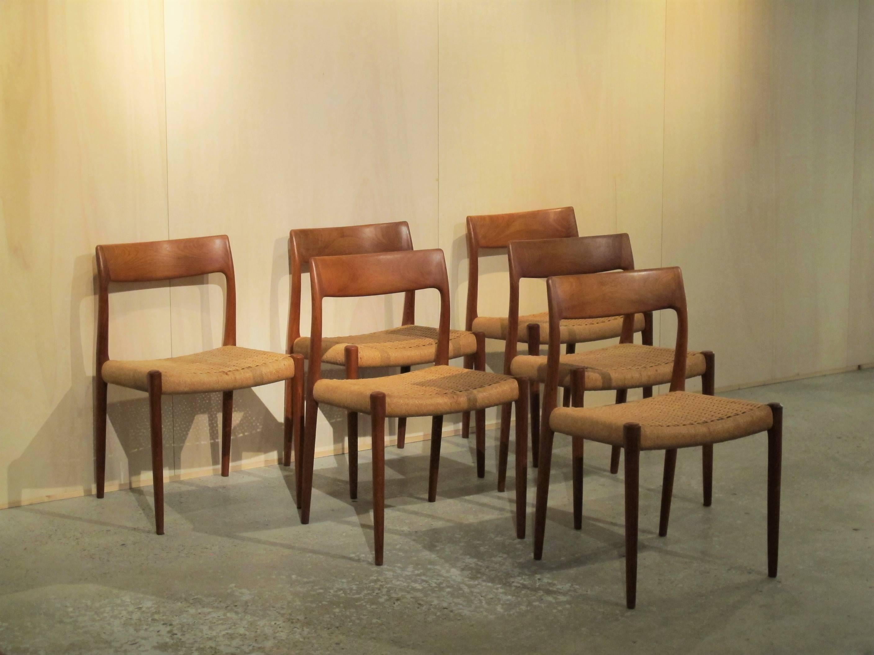 Six stylish diningroom chairs designed and executed by well-known and rewarded Danish designer Nils Otto Møller (1921-1981). 
Simple elegant chairs: teak with papercord seating (ca.1955)

