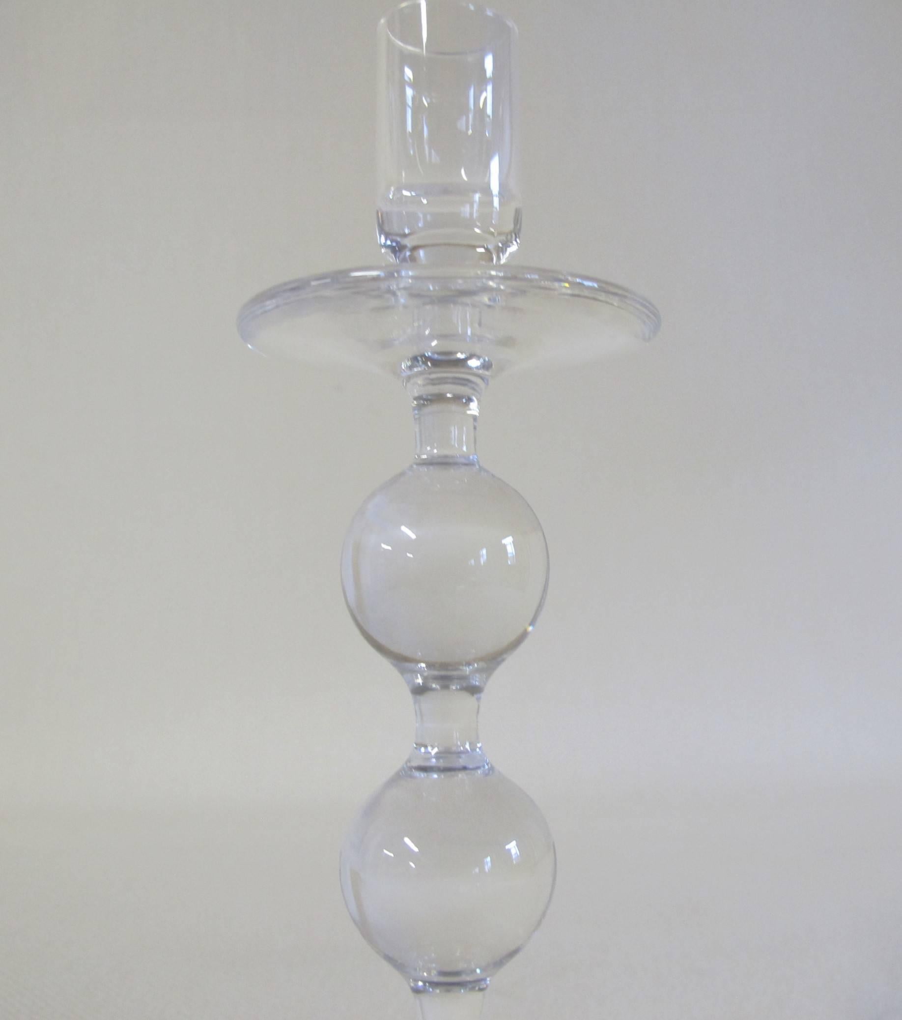 Crystal candleholder with three bulbs, designed by Andries Dirk Copier (1901-1991), for the Leerdam Glassworks in 1963. With Royal Leerdam label.

        