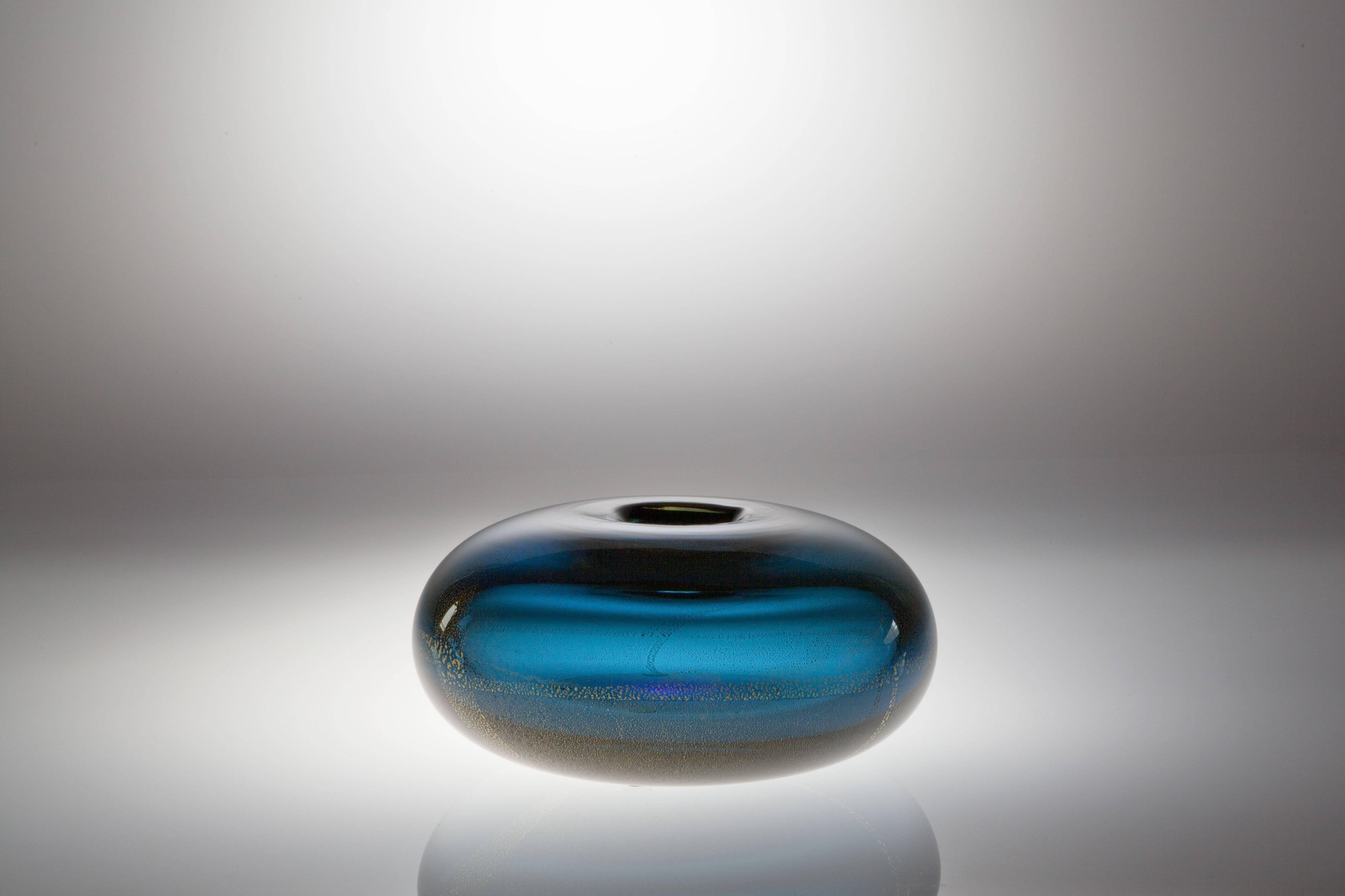 Beautiful sea blue glass vase with gold foil 'Sommersi Oro' ('Submerged Gold'), designed by Laura Diaz de Santillana for Venini, Italy, 1985. Signed 'Venini Italia Laura 85'.

This design is inspired by 'Sommersi foglia oro', designed by Carlo