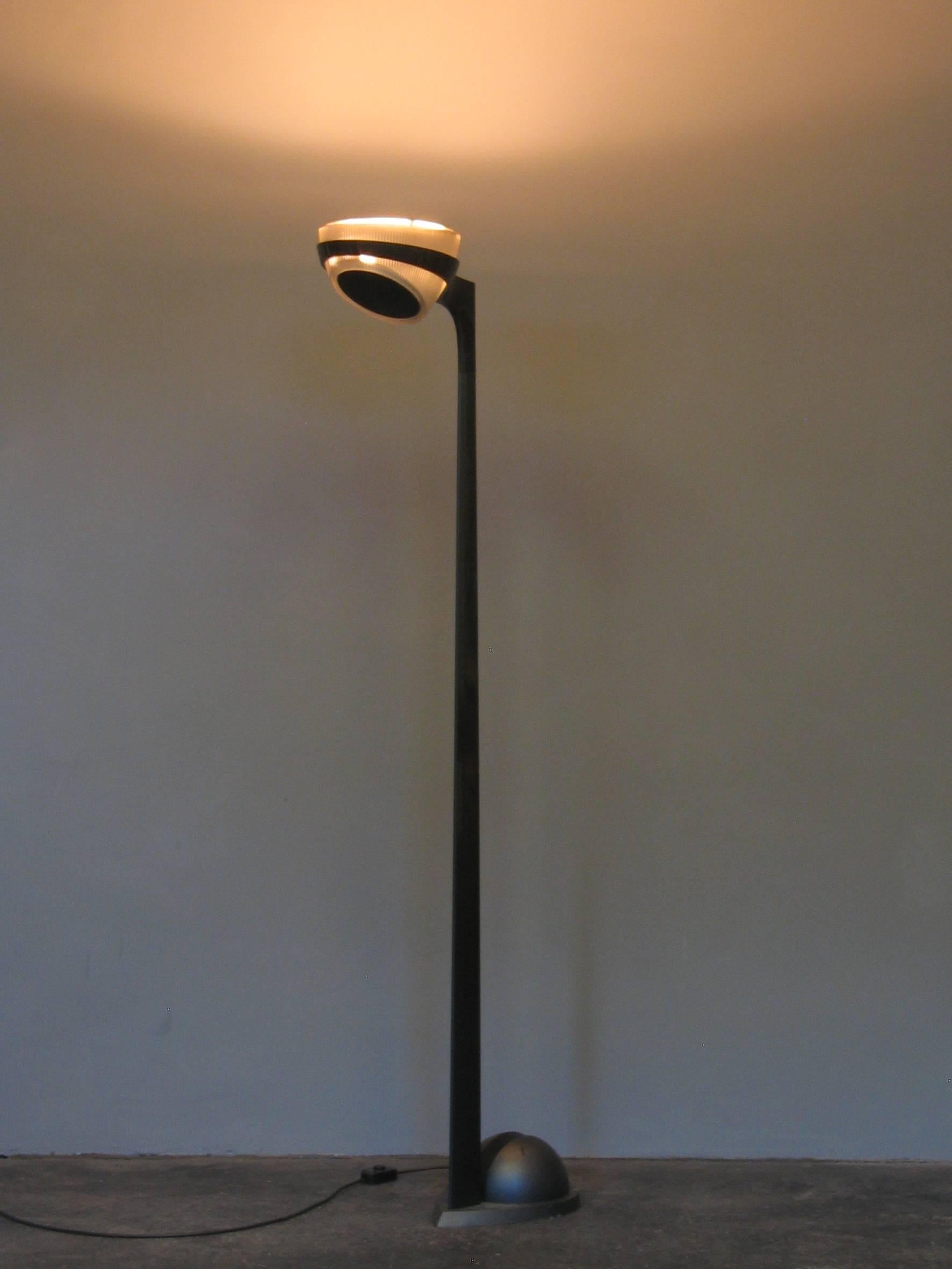 A Sistema Grall floor lamp by Ferrari, Pagani & Perversi for Arteluce. Awarded with the Compasso d'Oro in 1991. Published in Gramigna, Design Italiano 1950-2000, 2003.