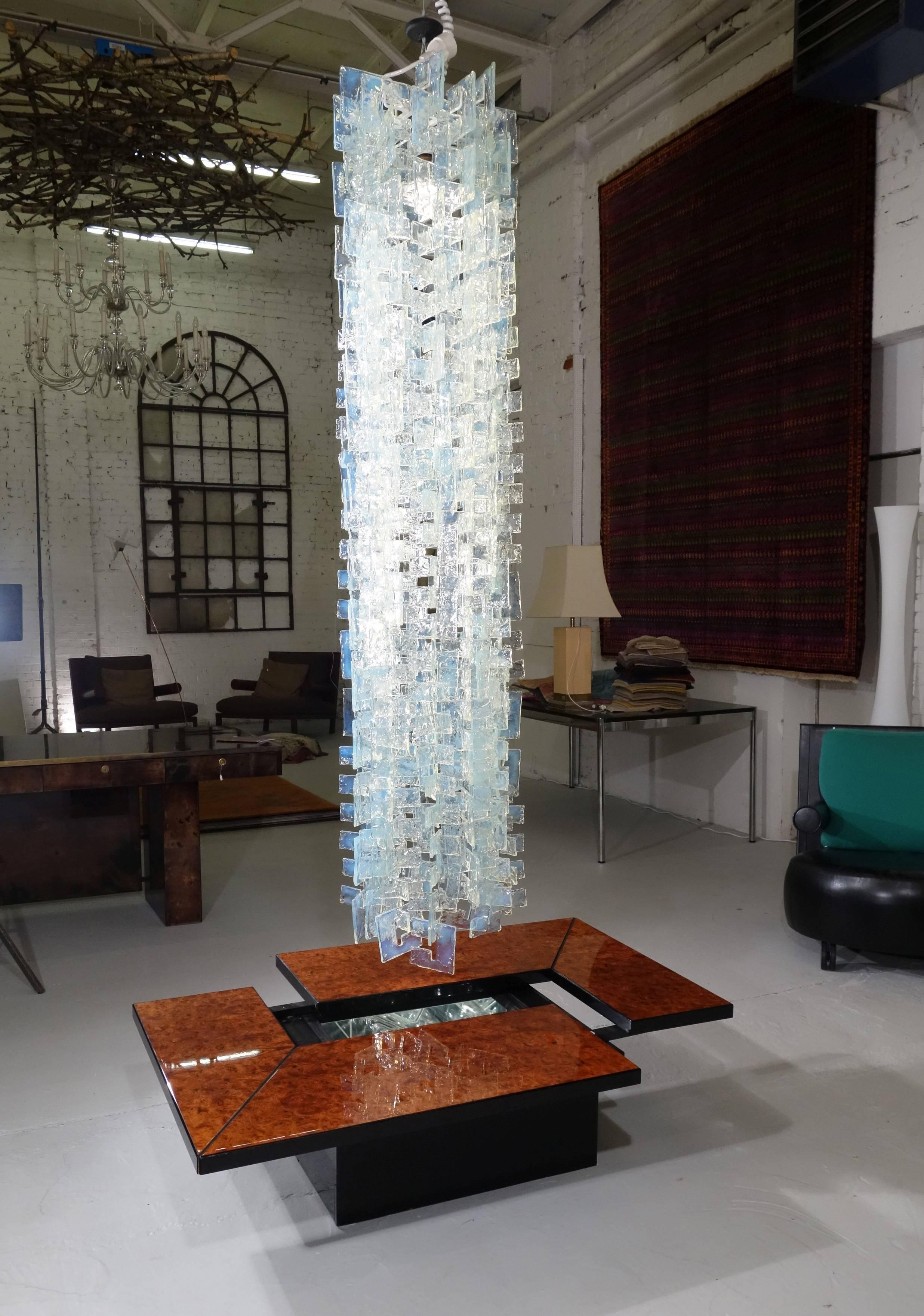 Large opalescent handblown glass chandelier in different hue by Mazzega.
More than 270 interlocking pieces.