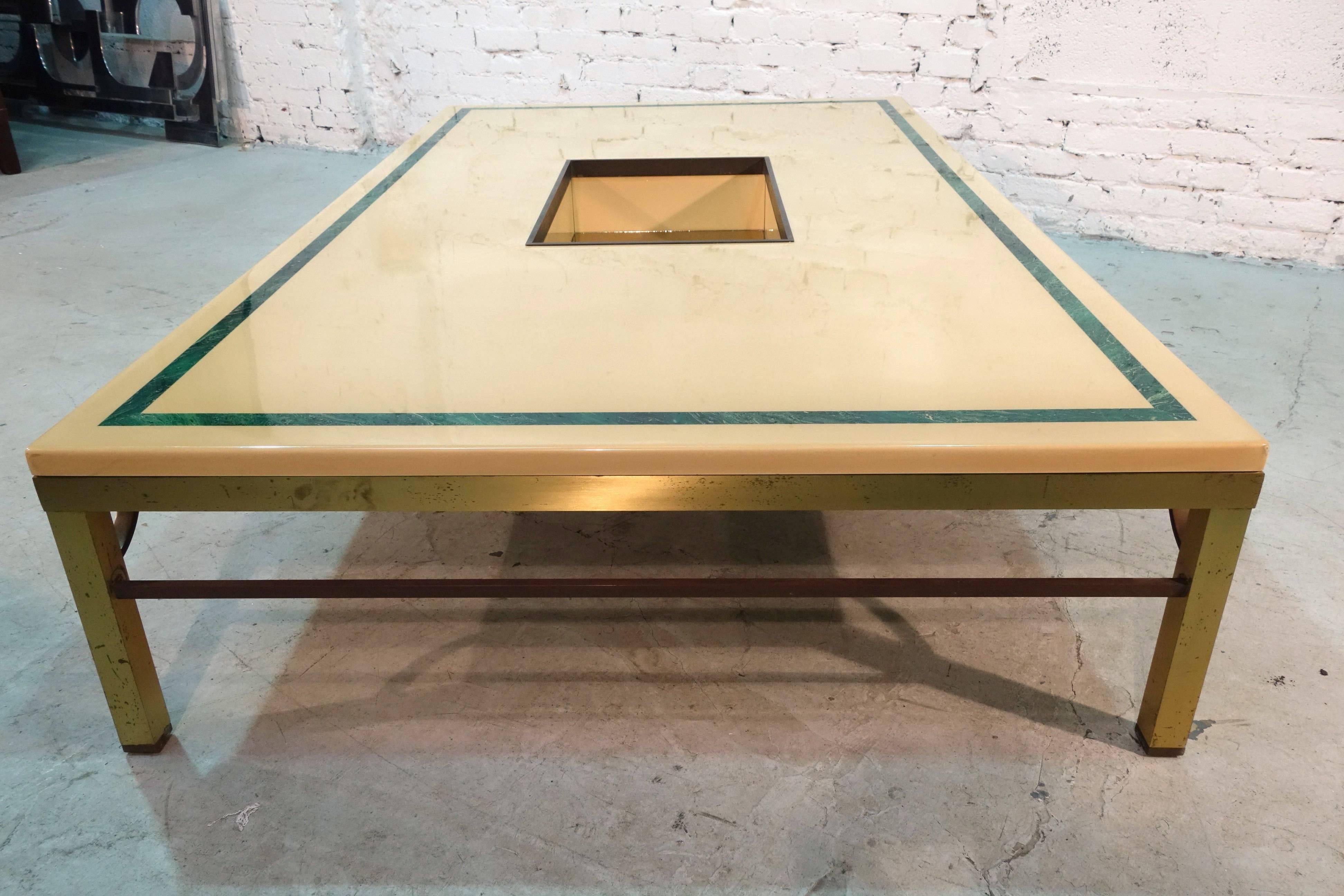 Huge bar center table attributed to Romeo Rega in white lacquer.
Base in brass.