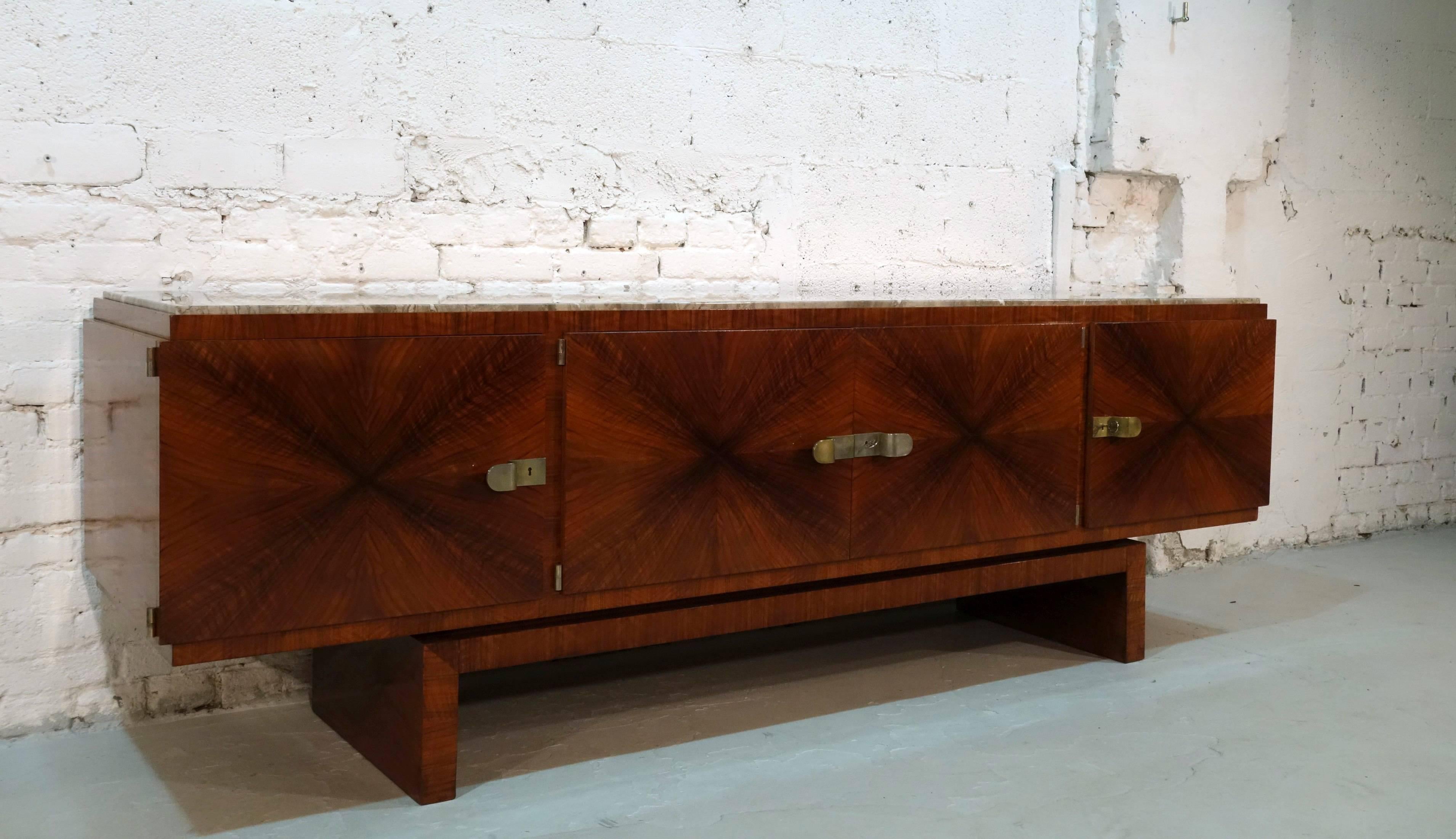 Exemplary sideboard on Asian inspired base of Caucasian walnut with marble top and nickel plated fittings. Executed by Deutsche Werkstätten Hellerau.

The same model also on view at the Museum of Decorative Arts, Berlin.