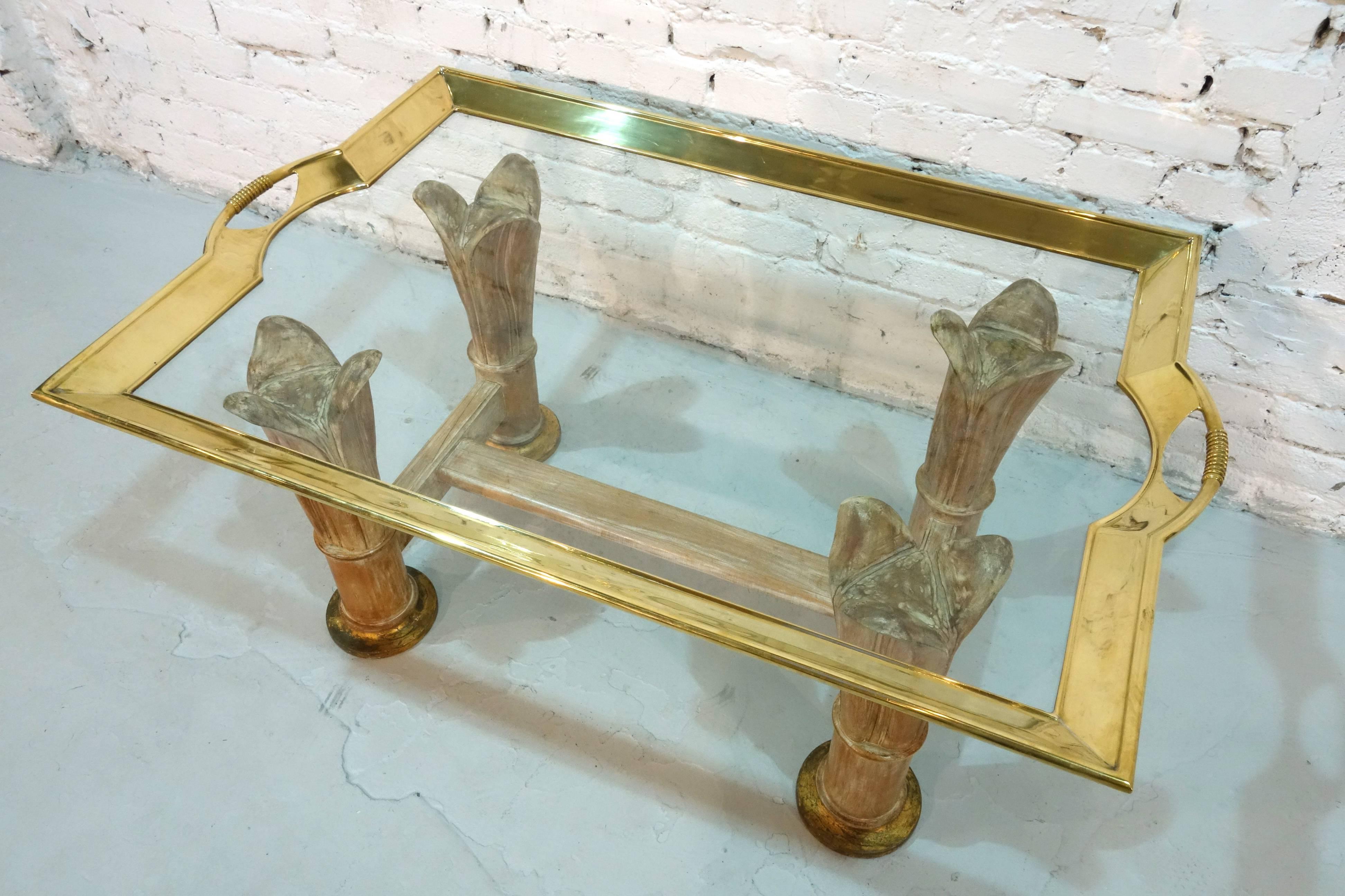 Large Italien coffee table with the base in wood and a removable tablet in gilded bronze.
According to the previous owner came the table from Florence.
The frame is molded in one piece.