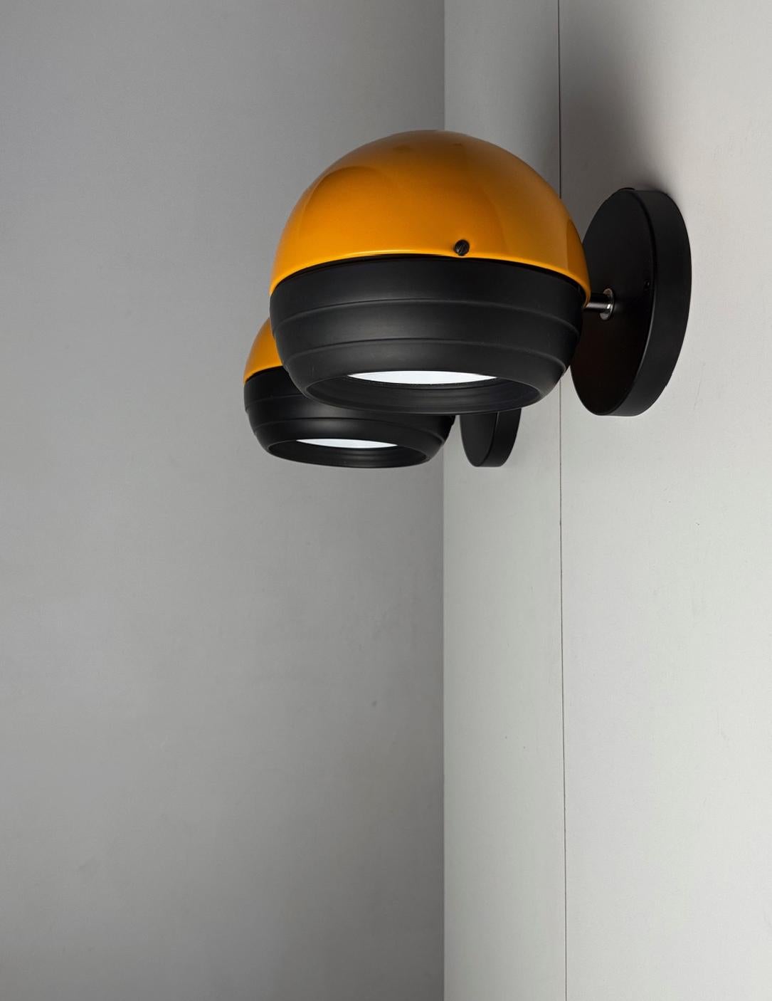 Coppia di appliques Doddó di Eduardo Albors per Lamsar (1973) - Illuminazione vintage A Space Age

Questa rara coppia di applique Doddó, disegnata da Eduardo Albors per Lamsar nel 1973, è un eccezionale esempio di design dell'A Space AGE.