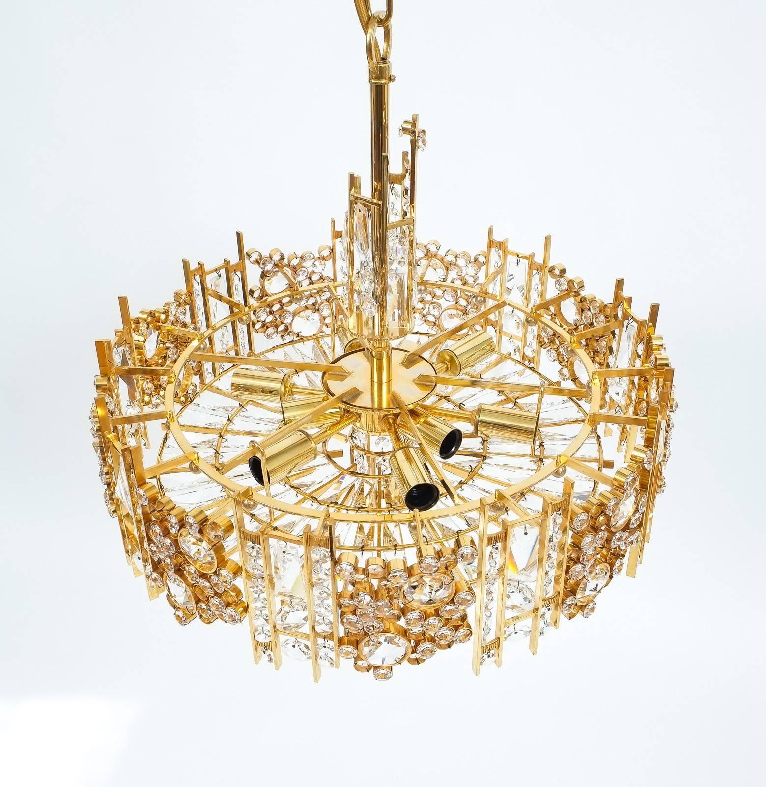 One of Two Golden Brass Crystal Glass Encrusted Chandeliers Palwa, Germany 1960 In Good Condition In Vienna, AT