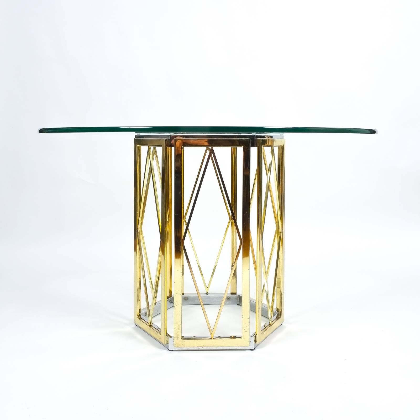 Ornamental centre table in the style of Romeo Rega, Italy, circa 1970. - Base only- Heavy octagonal base made from brassed and chromed steel. Base only. The thick tabletop must be replaced due to flaws and scratches. We recommend to have this done