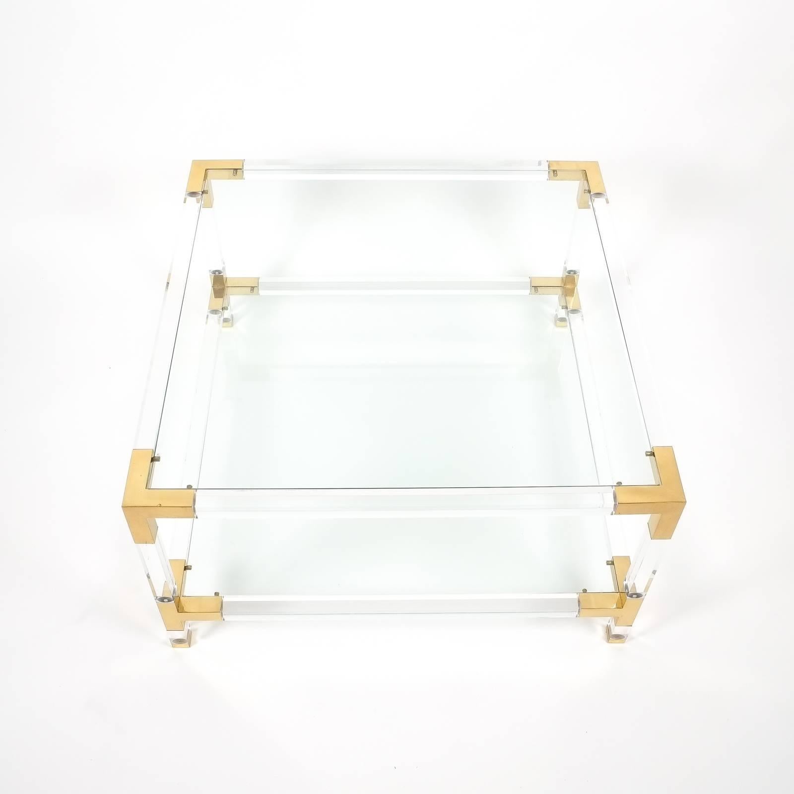 lucite and brass coffee table