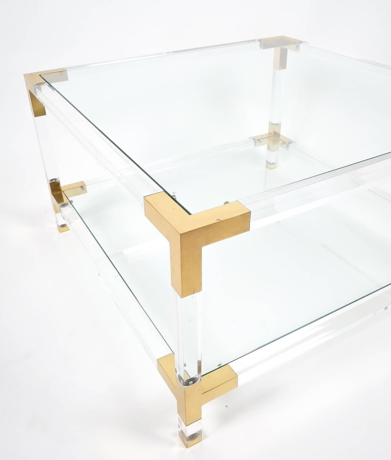 lucite brass coffee table