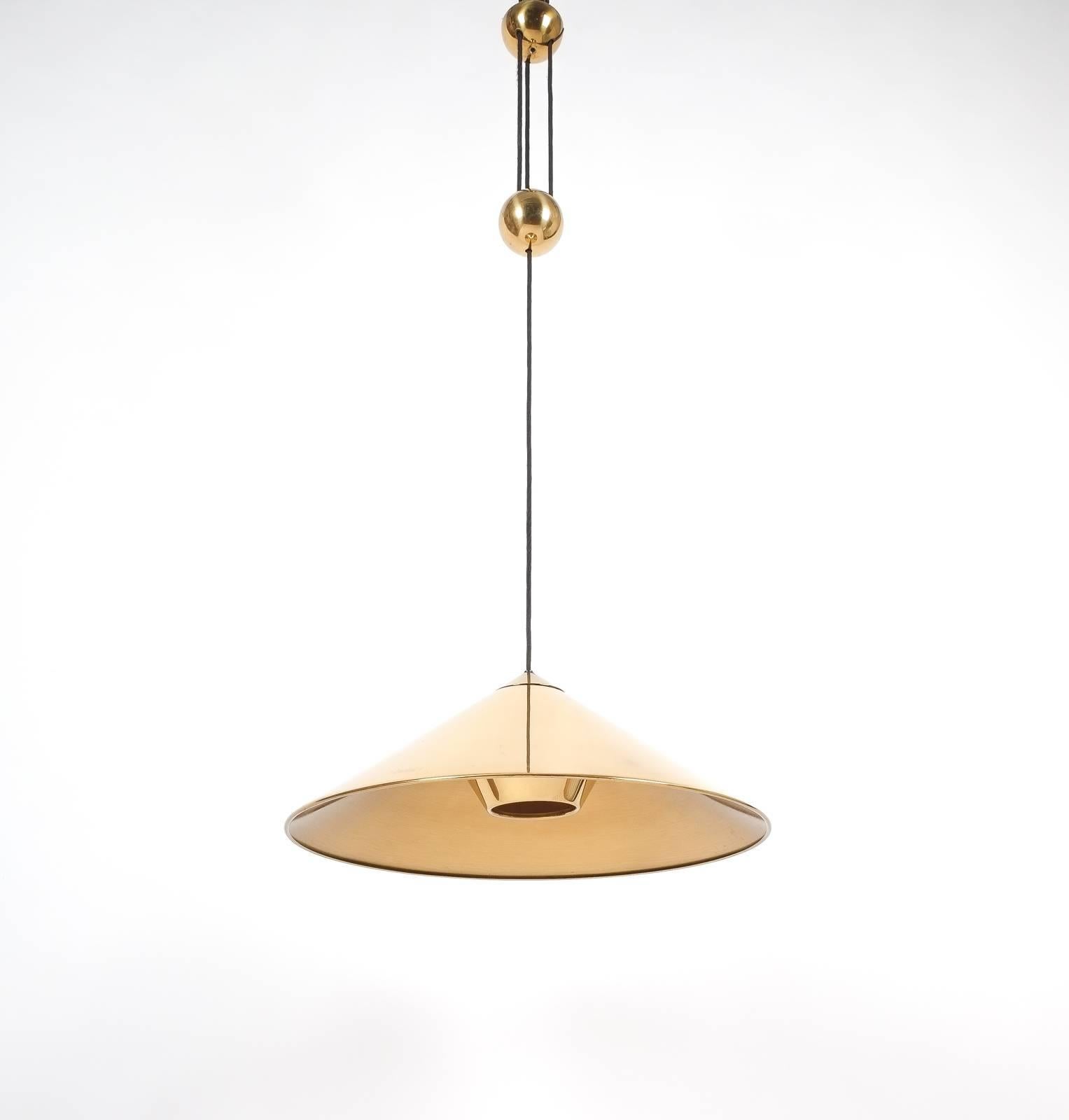 German Large Adjustable Polished Brass Counterweight Pendant Lamp by Florian Schulz