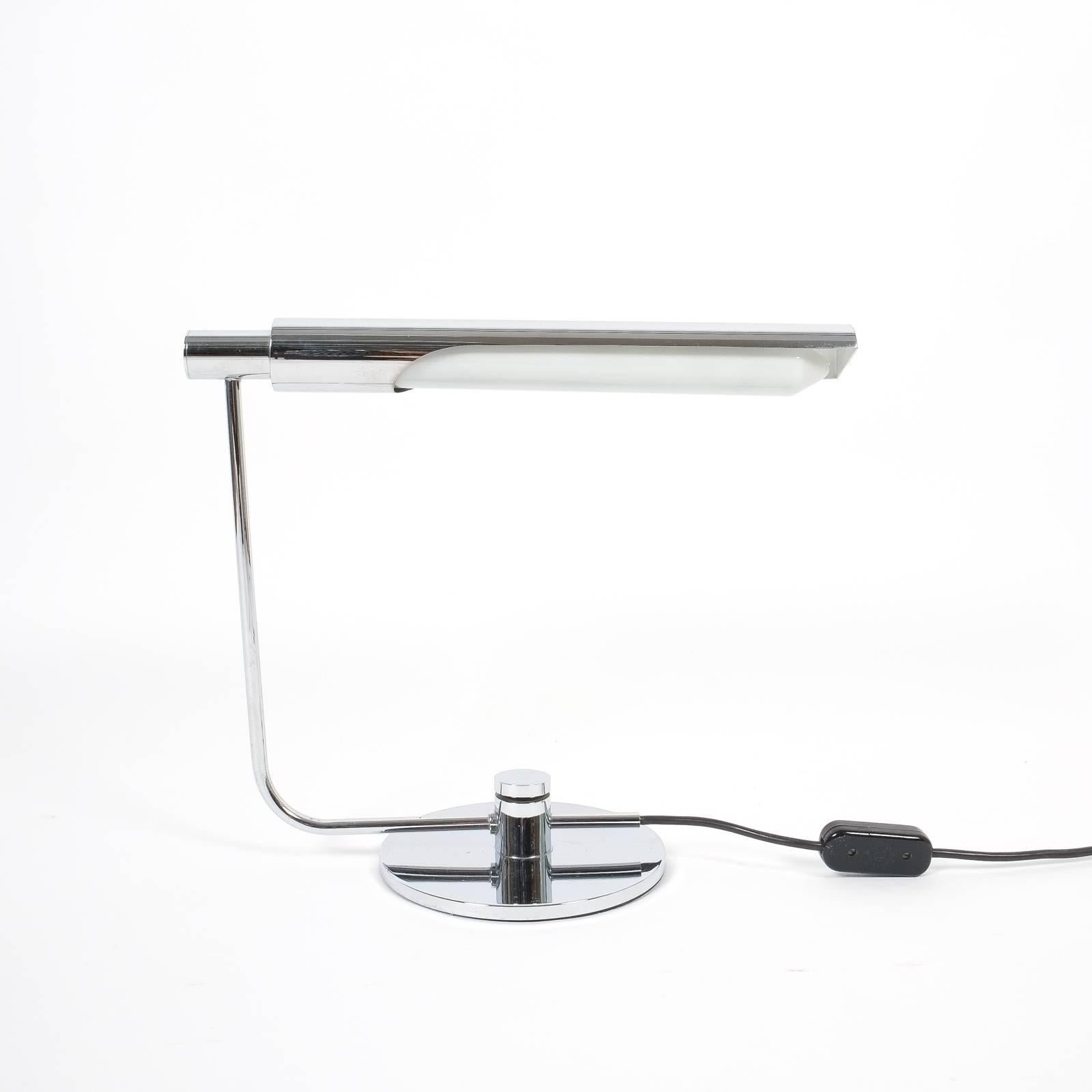 Elegant chrome desk lamp attributed to the Swiss designers Rosemarie and Rico Baltensweiler. It can easily be adjusted in height and is in very good condition with electricals in original condition. Please scroll down to find all of our items using