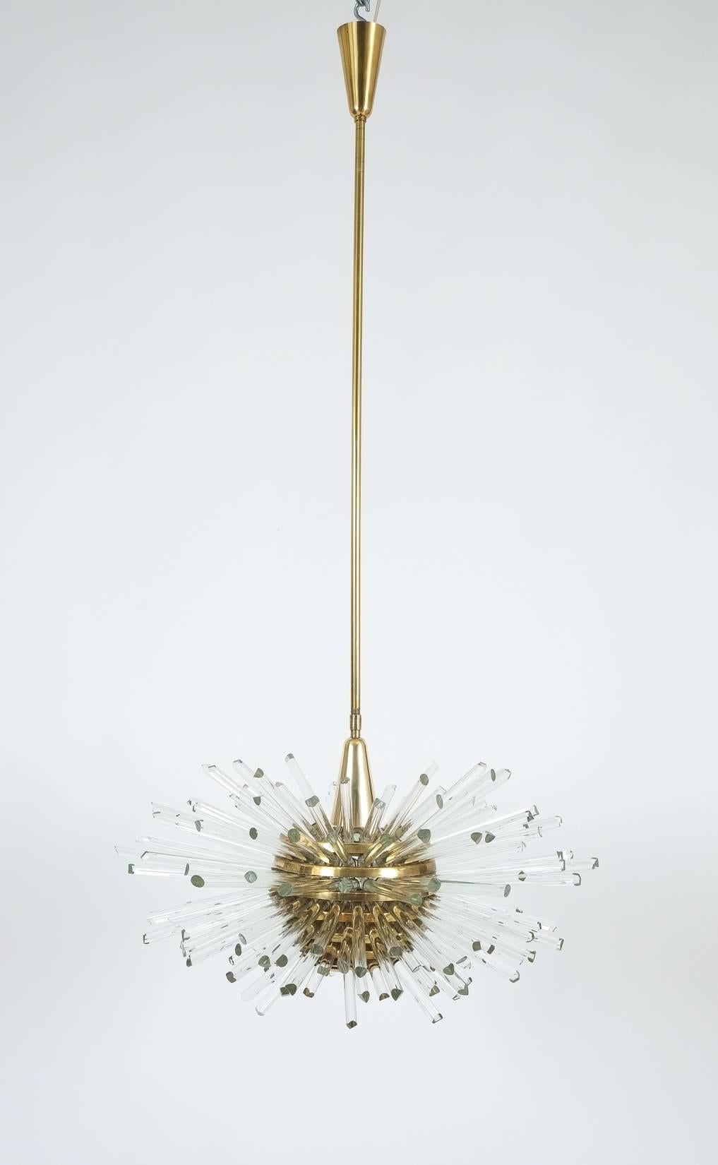 Magnificent 'Miracle' chandelier by Bakalowits & Sohne / Vienna from the 1960s. Spectacular light with a multitude of radiant handmade glass rods pointing and carrying the light outwards to the tips. It's in excellent condition and newly rewired.