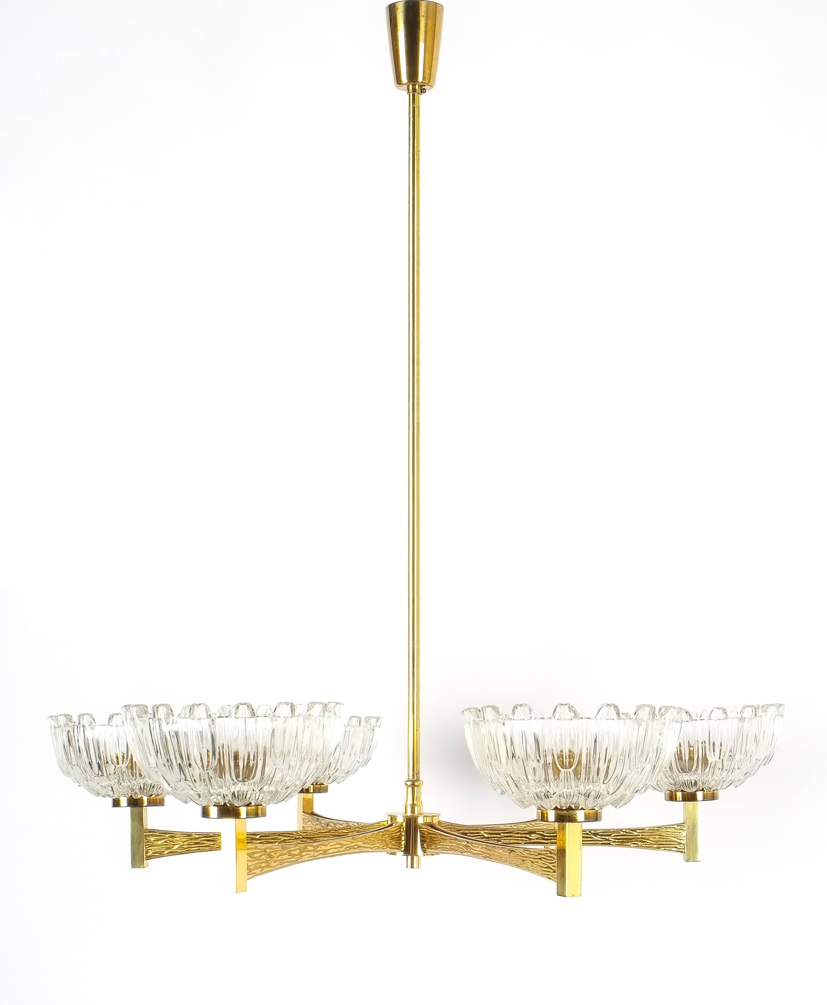 Exceptional brass frame chandelier with six frosted and polished crystal cups attributed to Hans-Agne Jakobsson, Sweden, 1960. Delicate details in the brass work and in excellent condition. Six large bulbs e27 with 60W each. The brass stem can be