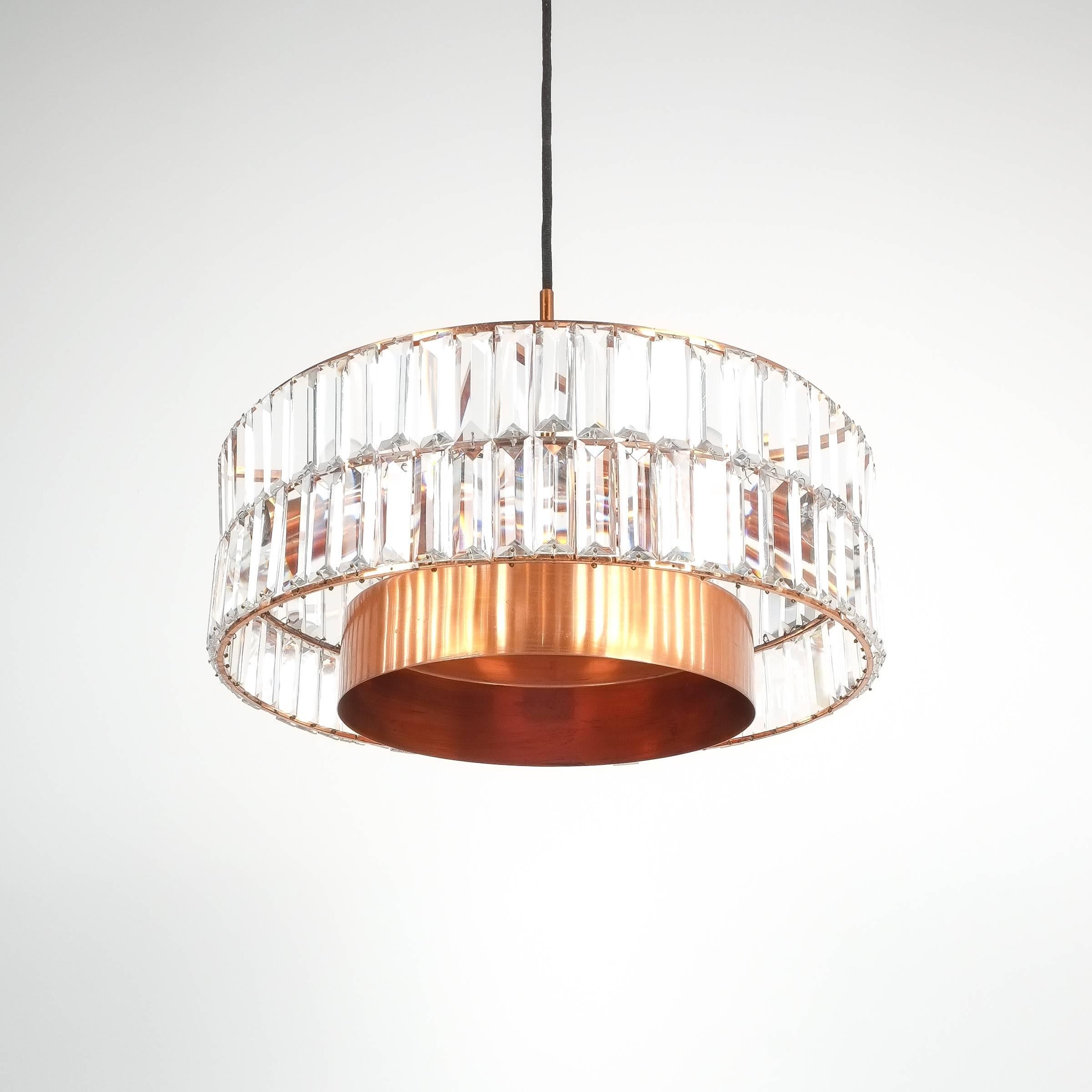 Jo Hammerborg attributed for Fog & Mørup large chandelier Denmark lamp, 1960. Made from copper and crystal cut glass this light illuminates beautifully with 11 bulbs in total (10x e14/1x e27) It has been refurbished and newly rewired for US and EU
