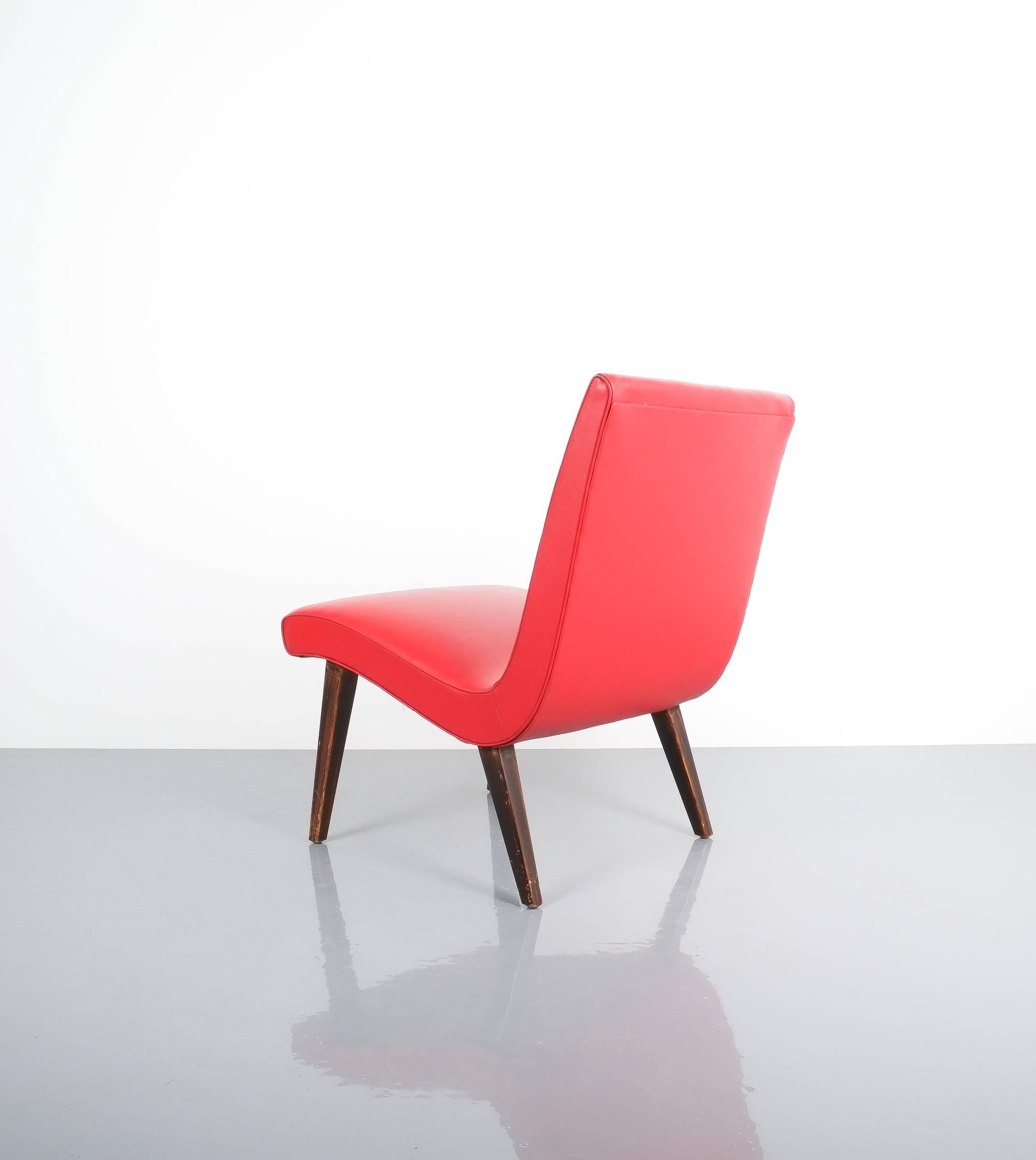 red faux leather chair