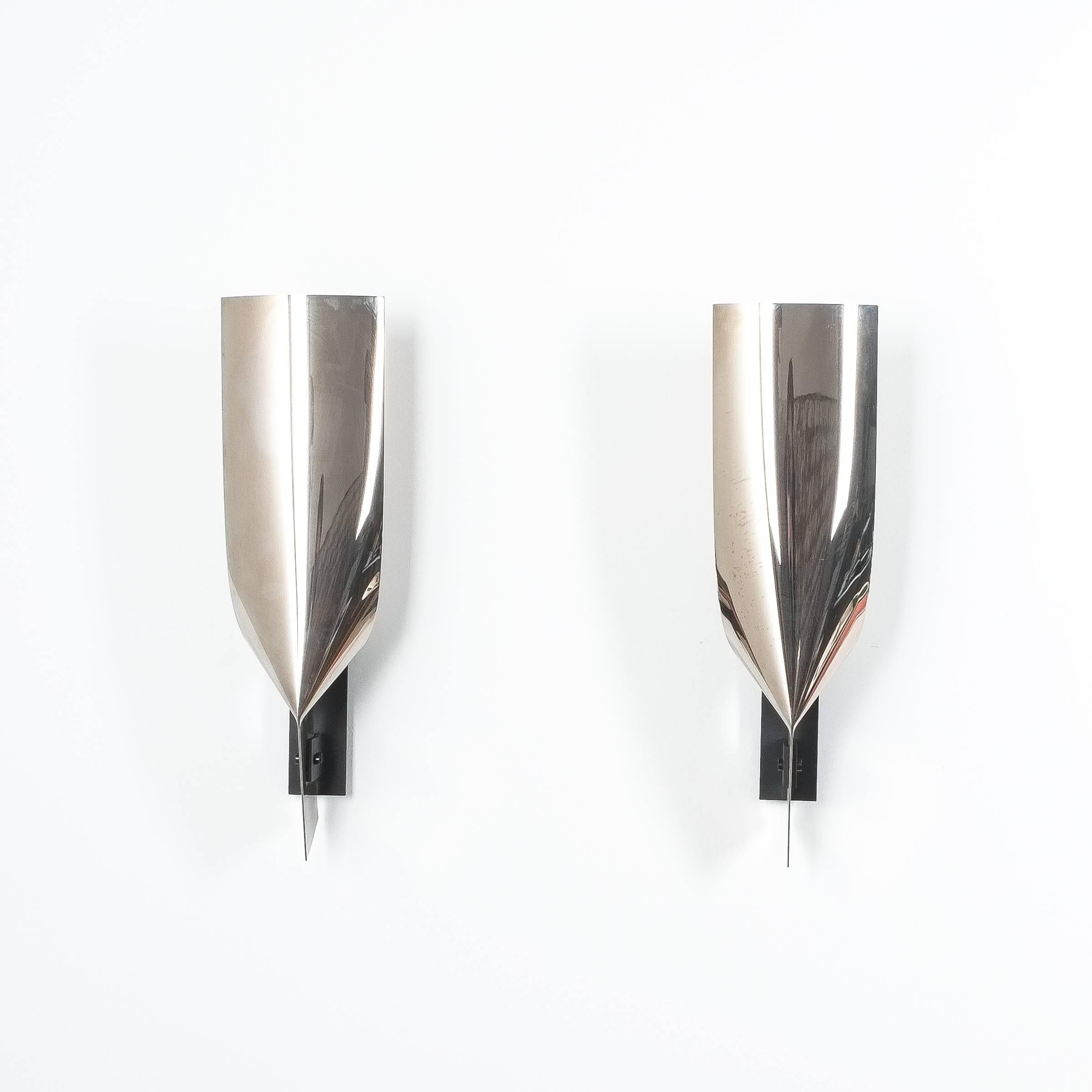 Polished artisan stainless steel wall lamps folded large sconces, France, 1980. Fantastic one-of-a-kind 21