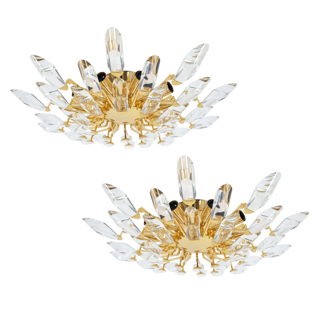 Gorgeous set of five identical italian crystal flush mounts.(24 inches in diameter) Gold plated brass branches and unique geometrical crystals. These fixtures hold 10 bulbs each and are all in excellent condition (it has been professionally cleaned