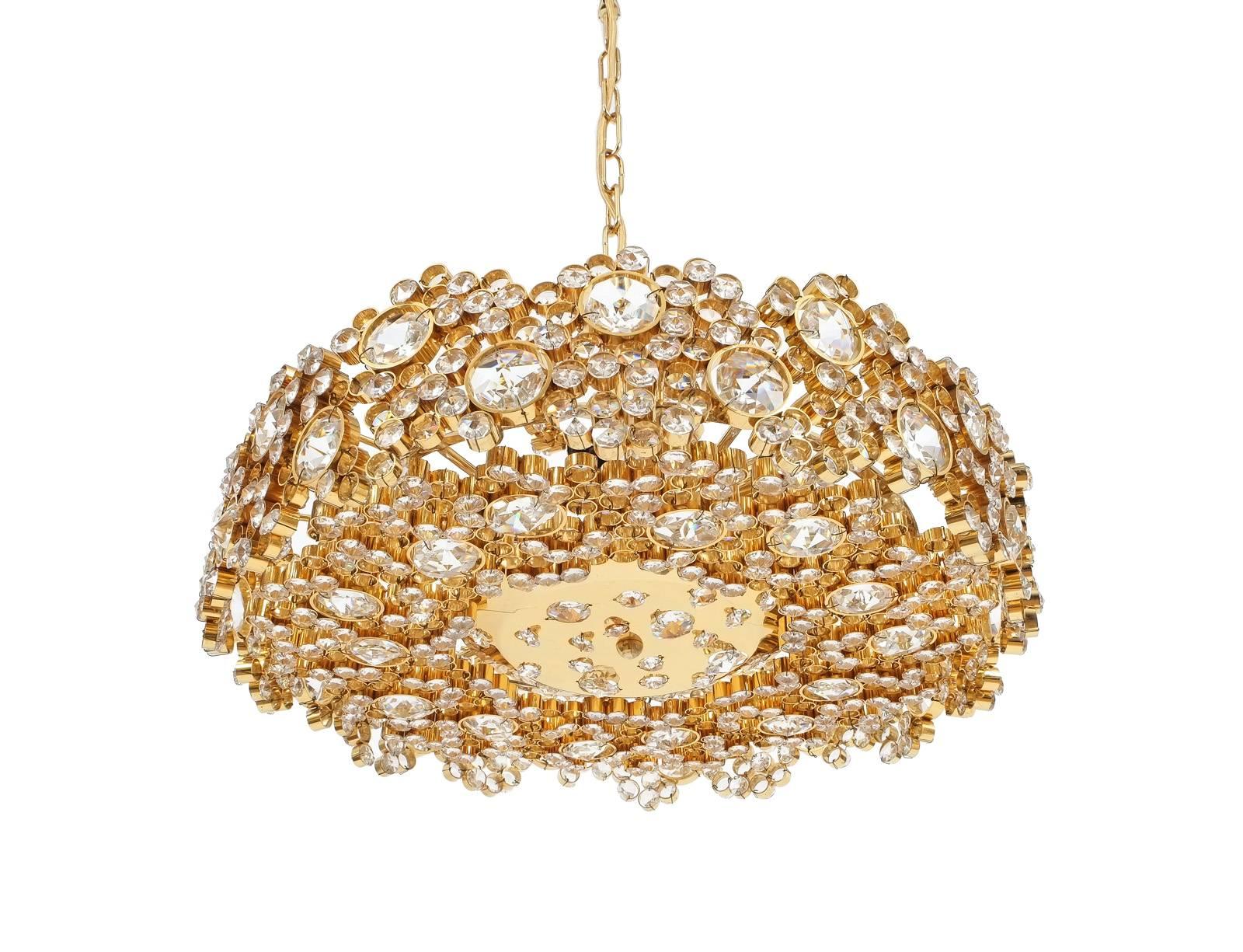 Pair Palwa Crystal Glass Gold Plated Brass Chandeliers Refurbished Lamps, 1960. We have a total of four pieces available. Priced individually. Measuring 19 inches in diameter these lamps were handcrafted and executed with great attention to detail,