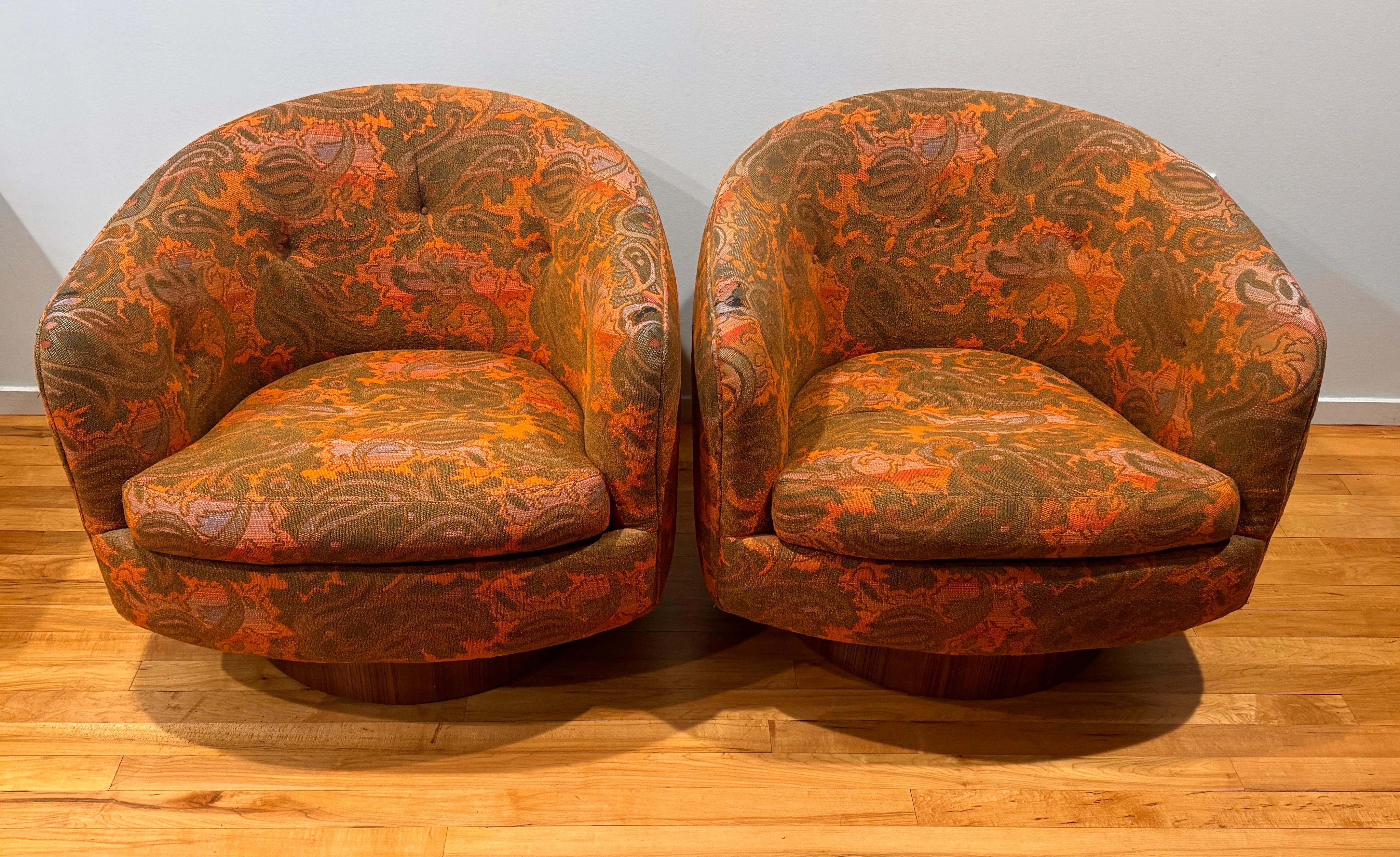 Pair of Milo Baughman for Thayer Coggin swivel and tilt lounge chairs. Great Original floral fabric on these. I had the bases re-veneer so they have no problems any more, please look at the last photos of the bases that is what they look like