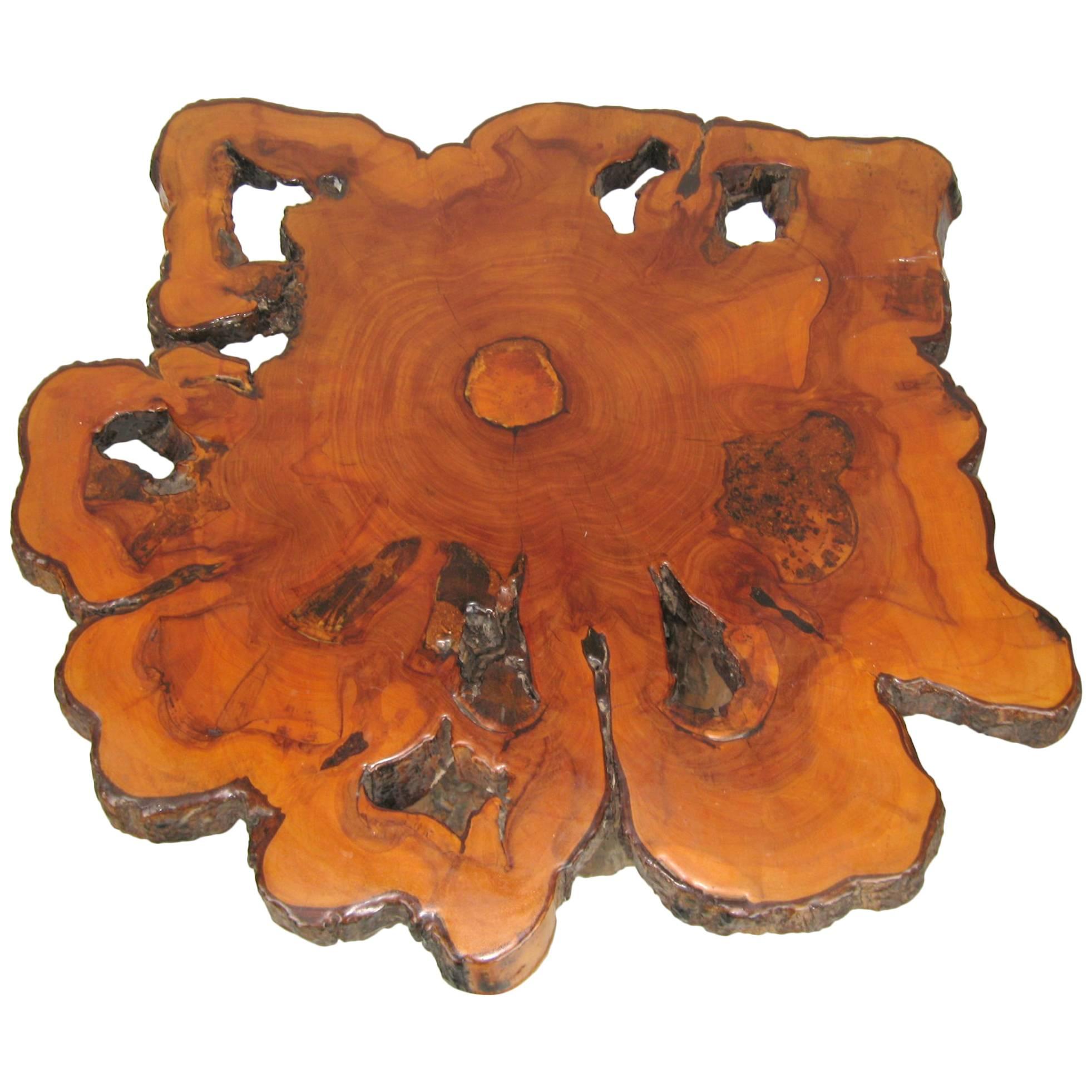 Stunning natural tree coffee table Tree stump bottom. Measuring 28 in x 24.5 in, 1/75 in thick, 16-3/8 in high.



     