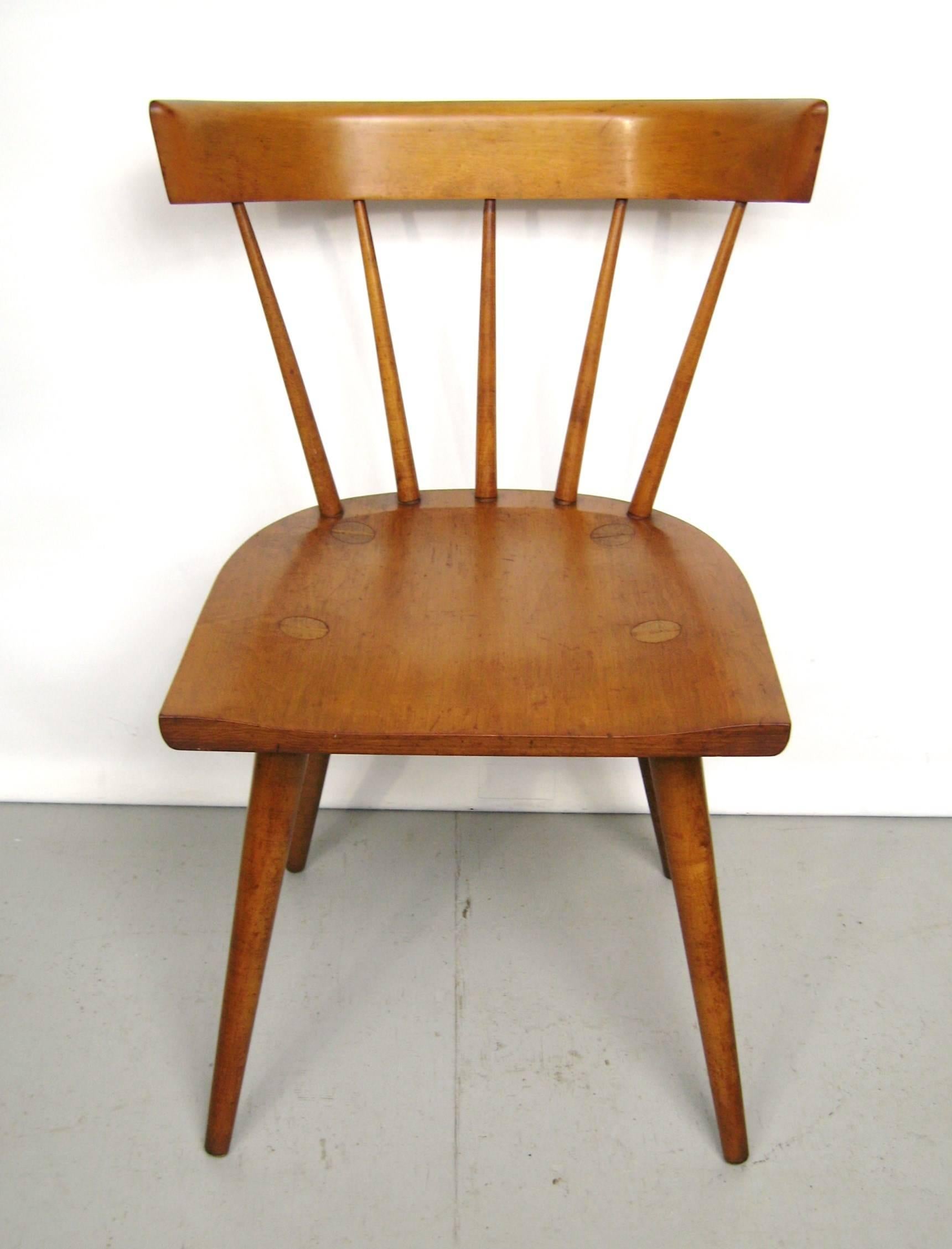 Maple Paul McCobb dining chair or desk chair, Planner Group.In wonderful vintage condition. Measuring: H 30 in    W 17 in   D 19 in  Seat height 17 in. Please be sure to check our storefront for more wonderful decorating pieces that range from