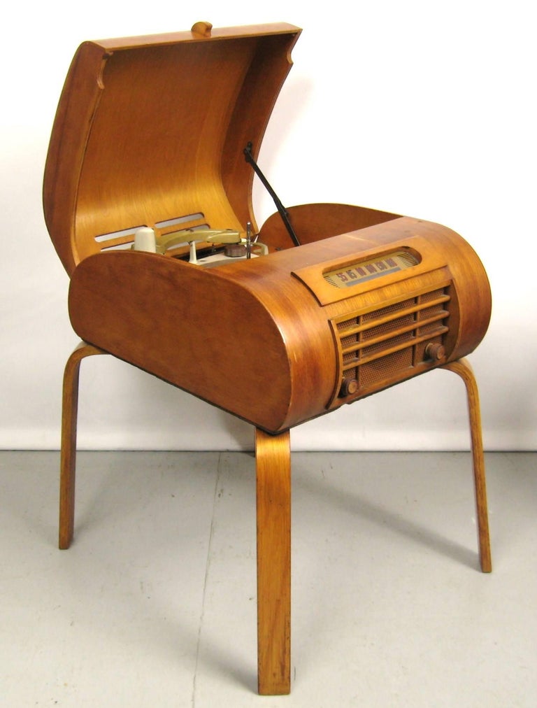 Stunning early 1940s record player or radio combination. Great display piece for your home. As found condition. Needs restoration. Be sure to check out my storefront for more decorating ideas, from Primitive to Mid-Century Modern!
 