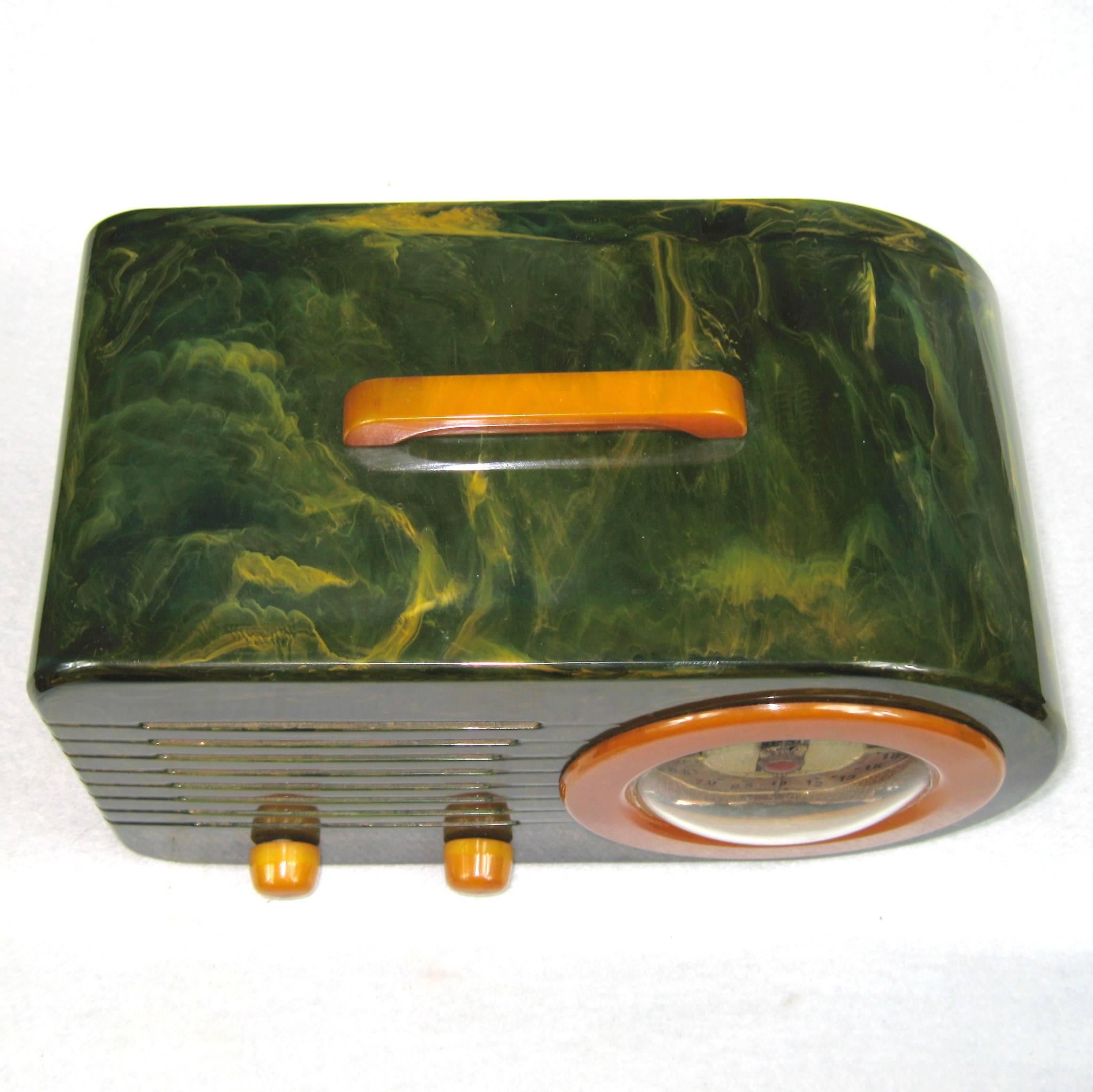 1940 Fada Bullet Catalin / Bakelite Tube Radio.
Blue case with pumpkin trim. This radio is very rare with short wave (Model 116).
The radio is original and in excellent condition, no cracks, no chips, no breaks, no repairs and No spray paint.