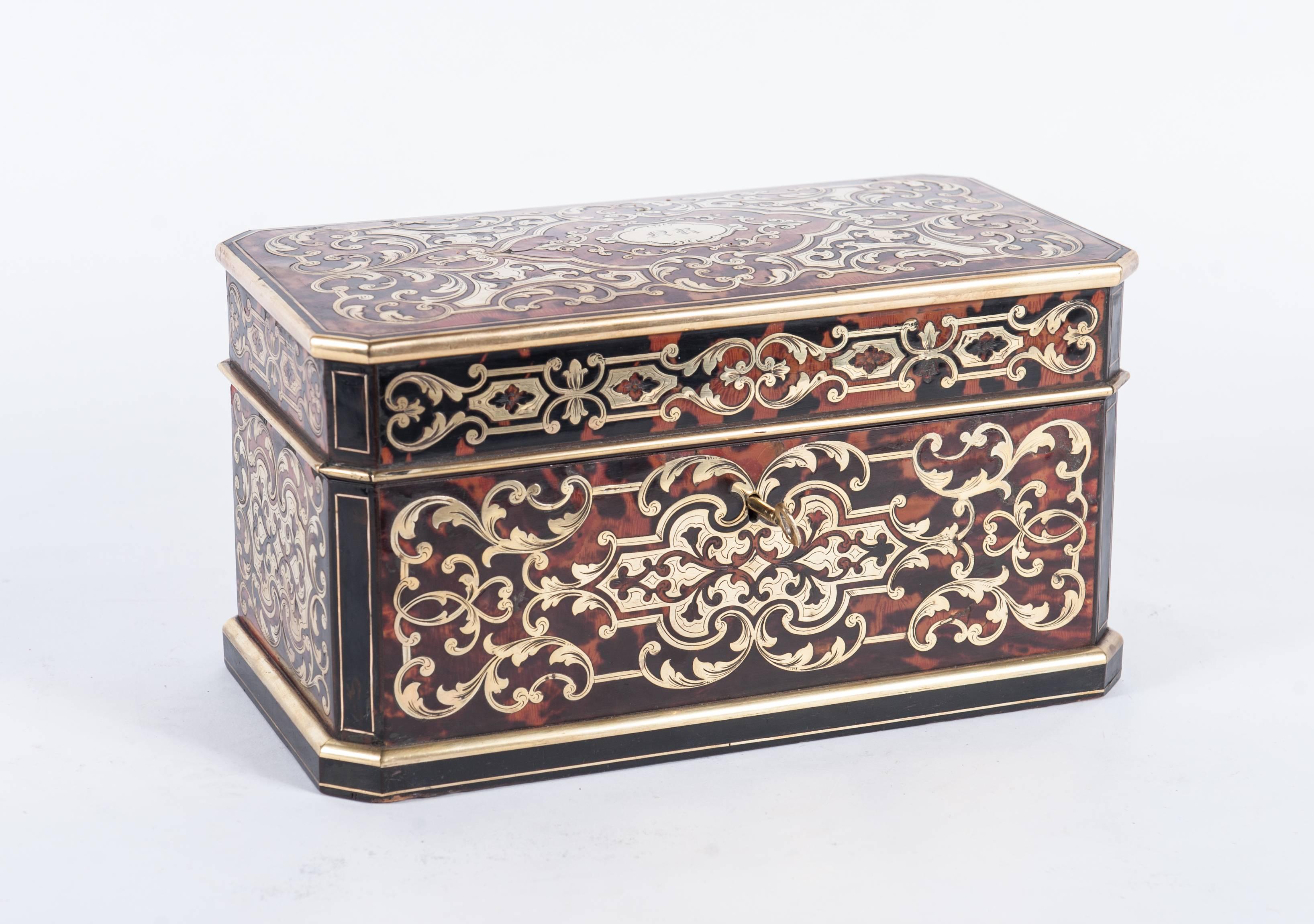 A nice boulle inlaid tea caddy, French circa 1860 in perfect condition. Tea caddy has original tea compartments with covers inside.

