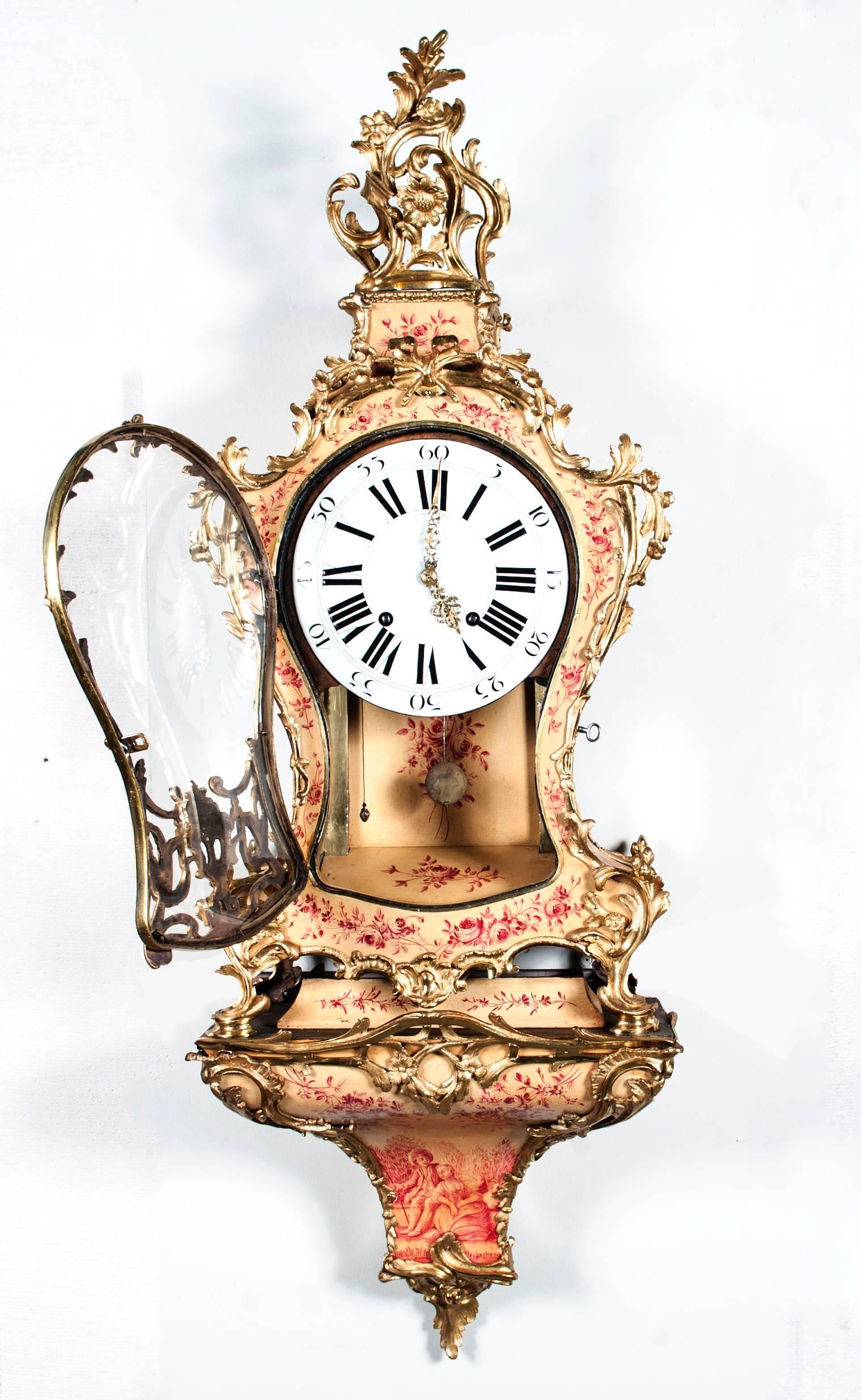 This nicely decorated Swiss console clock with very nice ormolu bronze mounts is from the Neuchâtel area and was very popular in those days. 
The charming waisted proportions are very beautiful the movement with quarter striking and verge