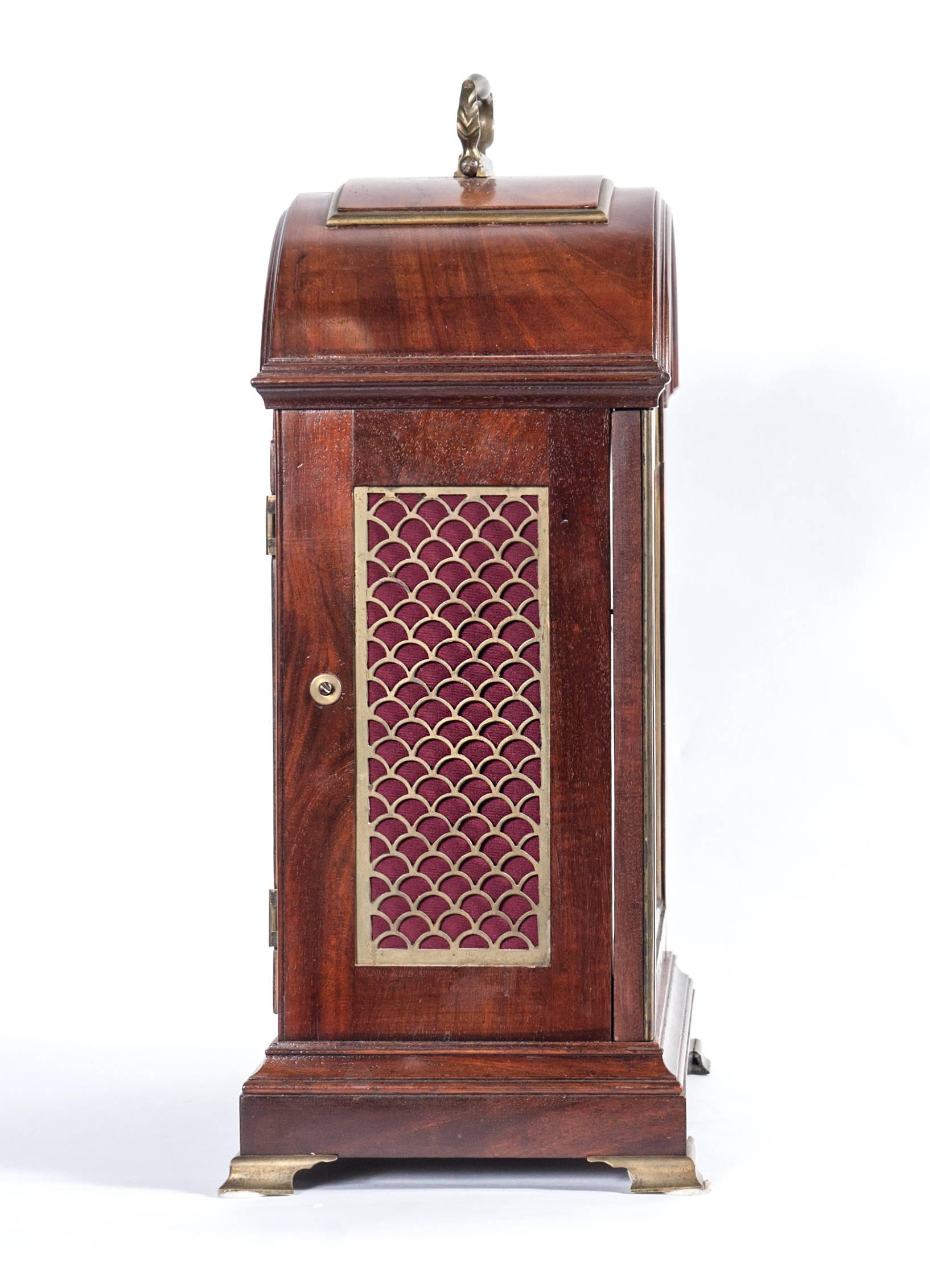 An English Regency well-figured mahogany striking table clock, circa 1800

Signed 