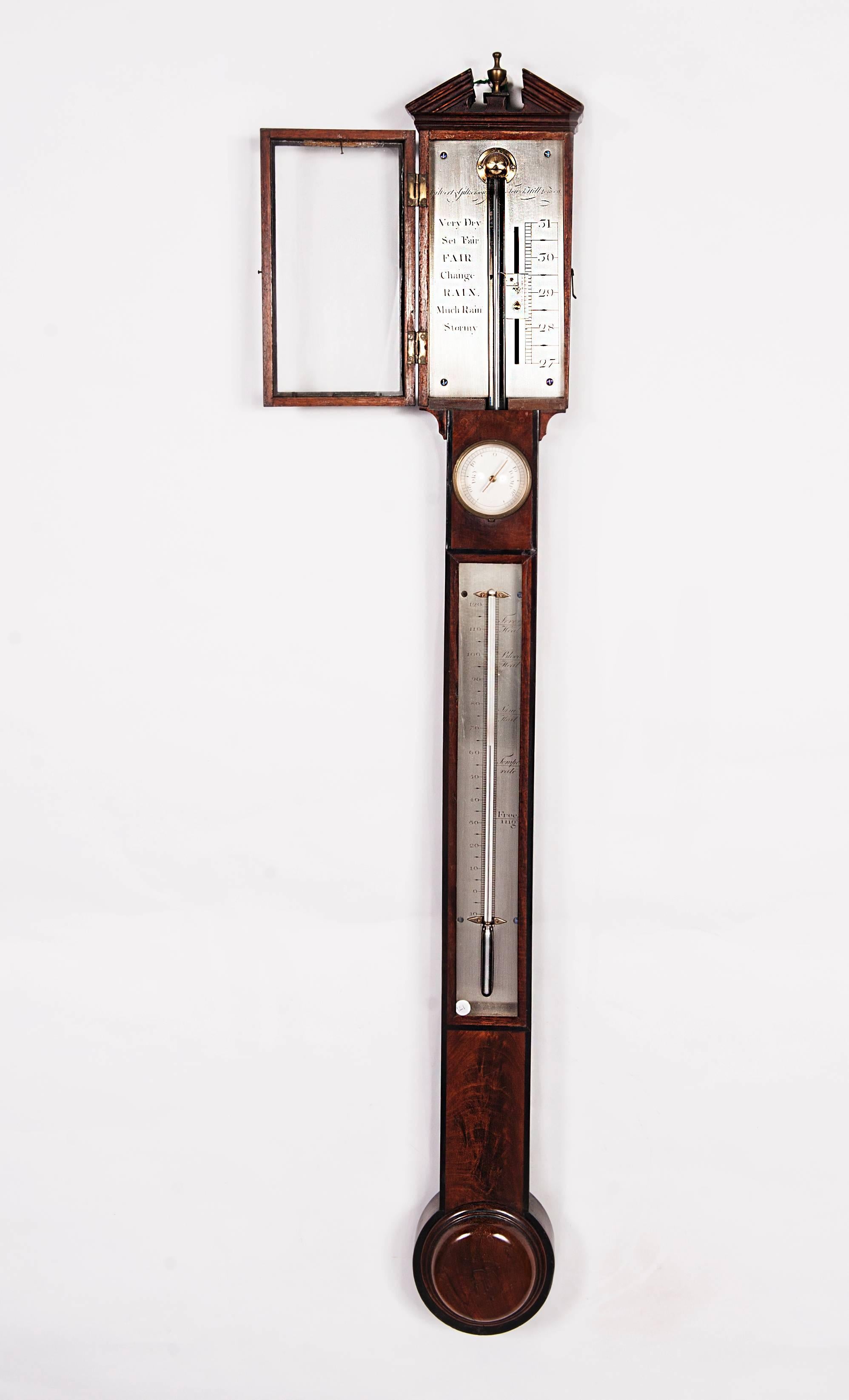 An English mahogany and ebony stick barometer, by Gilbert Gilkerson, circa 1820. Signature Gilbert Gilkerson, Tower Hill London.
