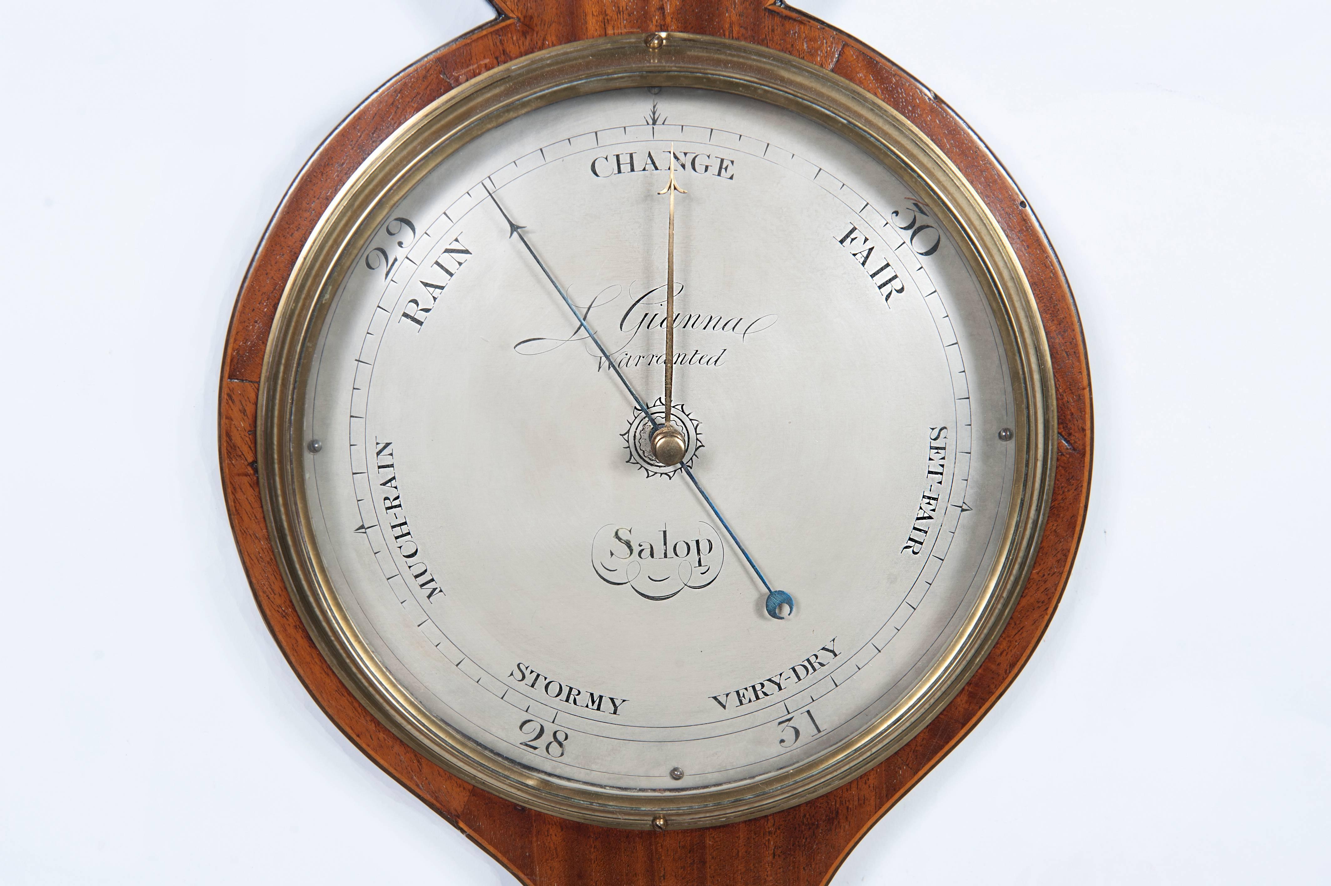 An English Regency Banjo barometer with mercury tube, circa 1820. Made by 