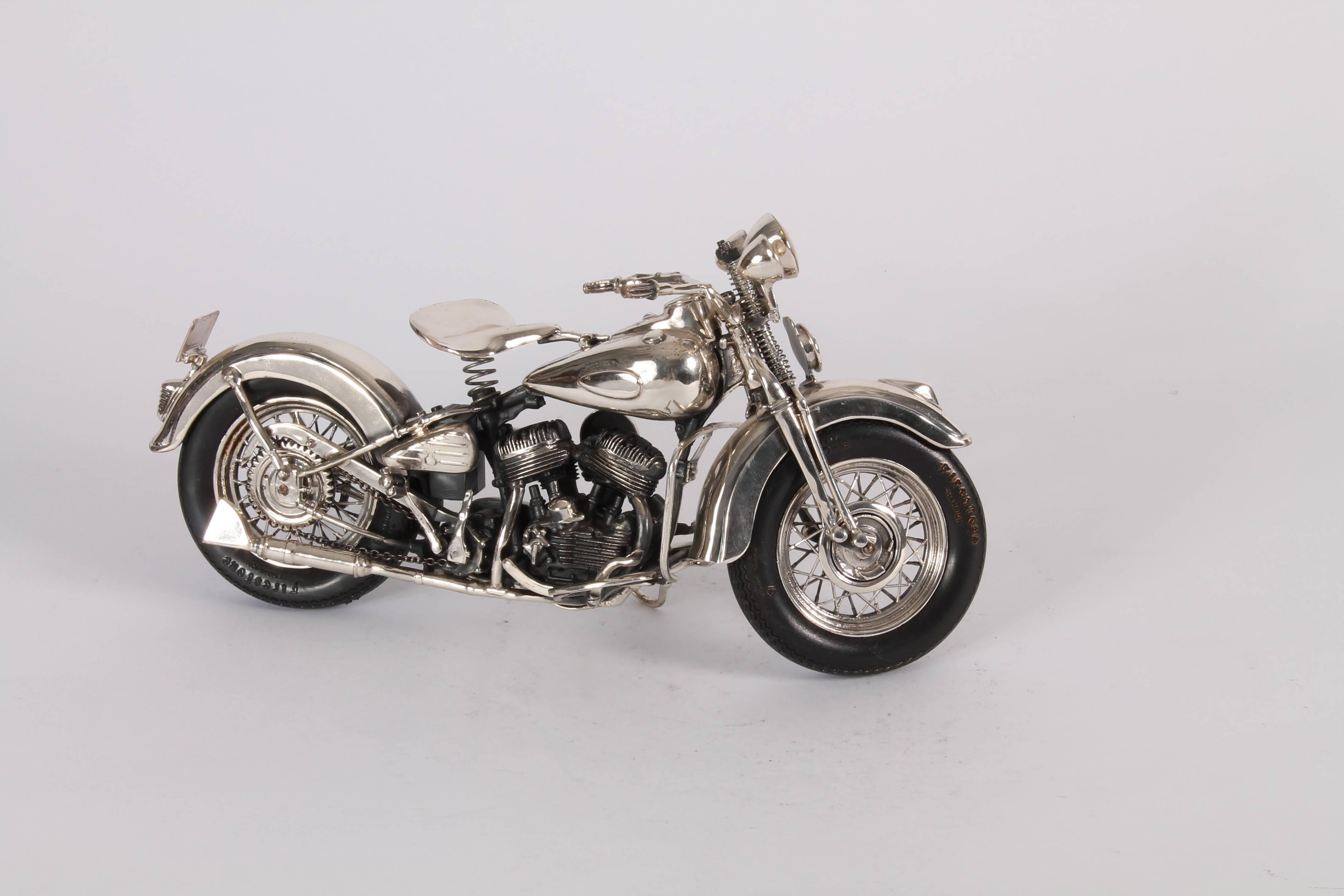 A silvered model of a Harley Davidson, modern.