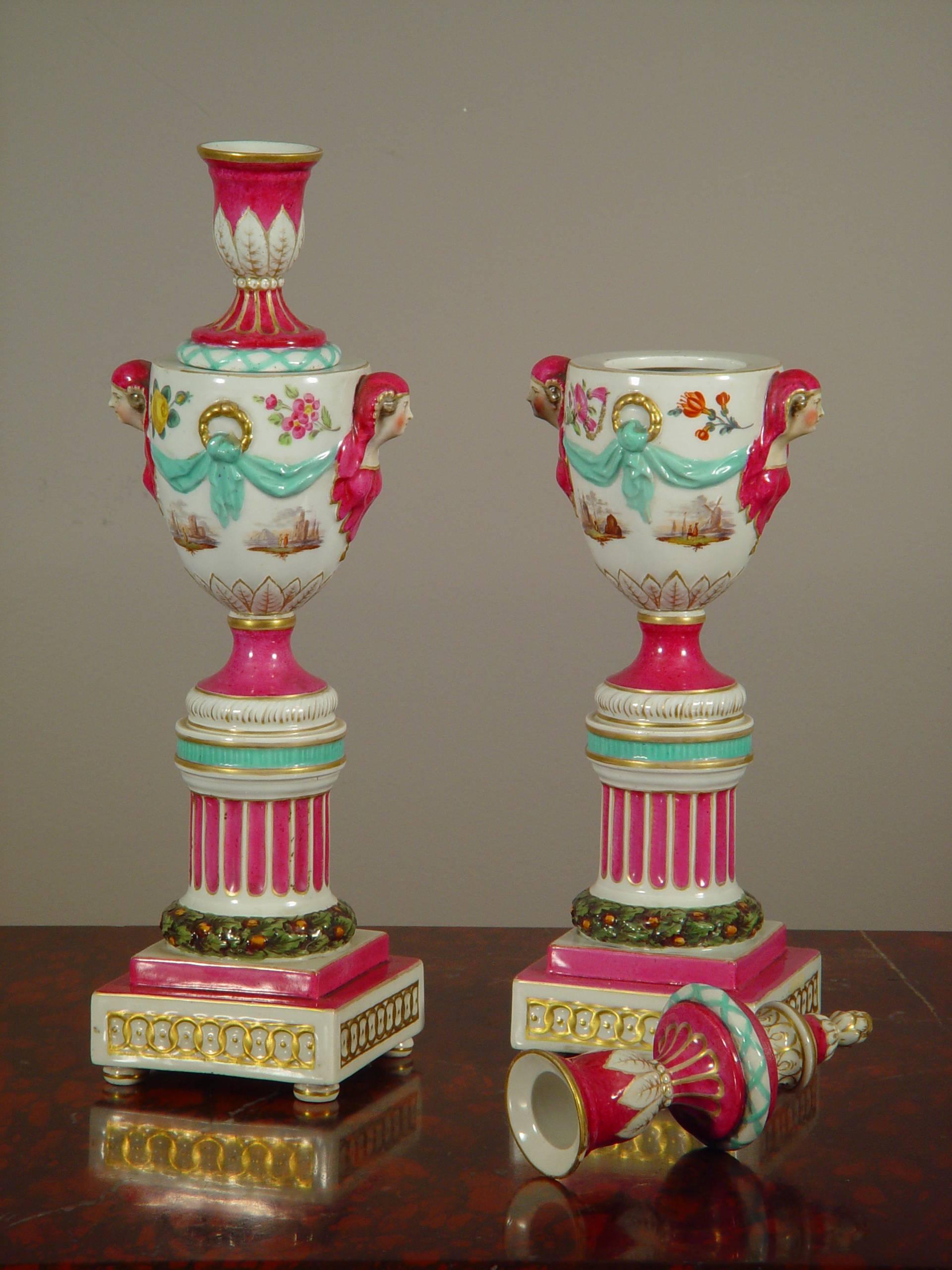 A pair of polychrome porcelain urns 'à double usage', mid-19th century.