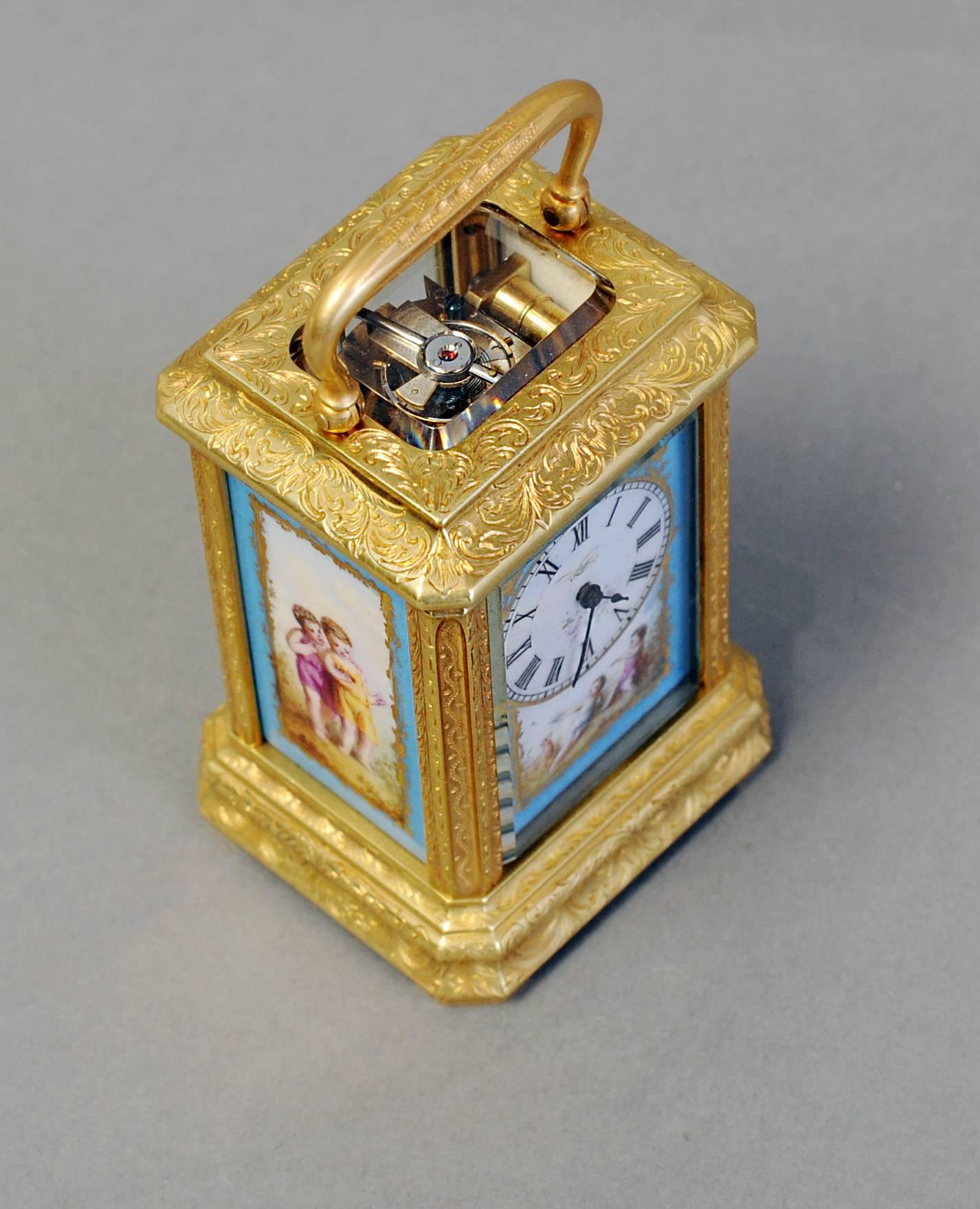 A good mid-19th century miniature carriage clock with lovely detailed panels showing romantic scenes. The guilt bronze nicely engraved gorge case with glass top. The Eight-day movement with silvered lever platform escarpment with compensated