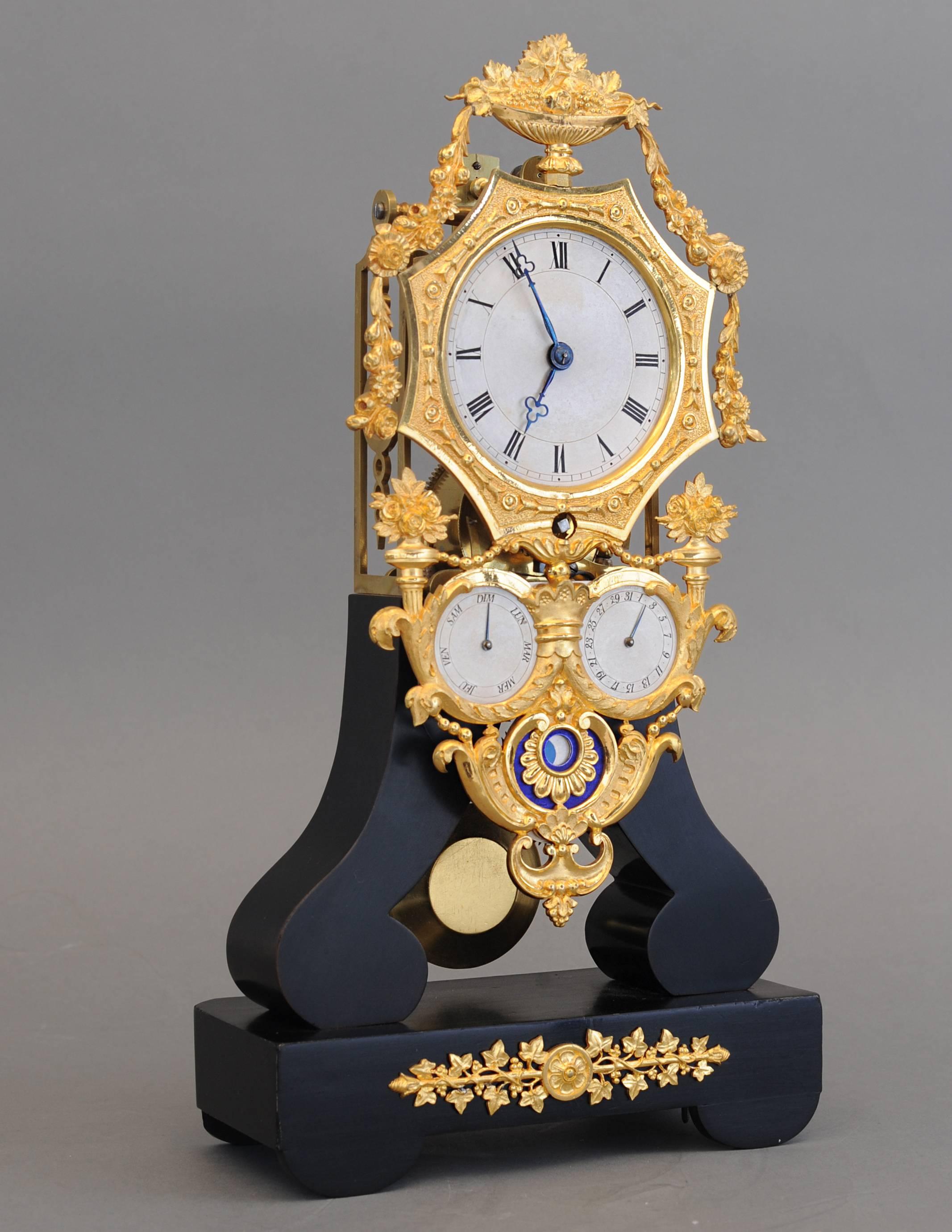 A very nice decorative well proportioned and interesting four dial Louis Philippe French skeleton clock from circa 1840. The high-quality Ormolu engraved frame with several dials: Hours, minutes, days, calendar, moon phases. Together with the