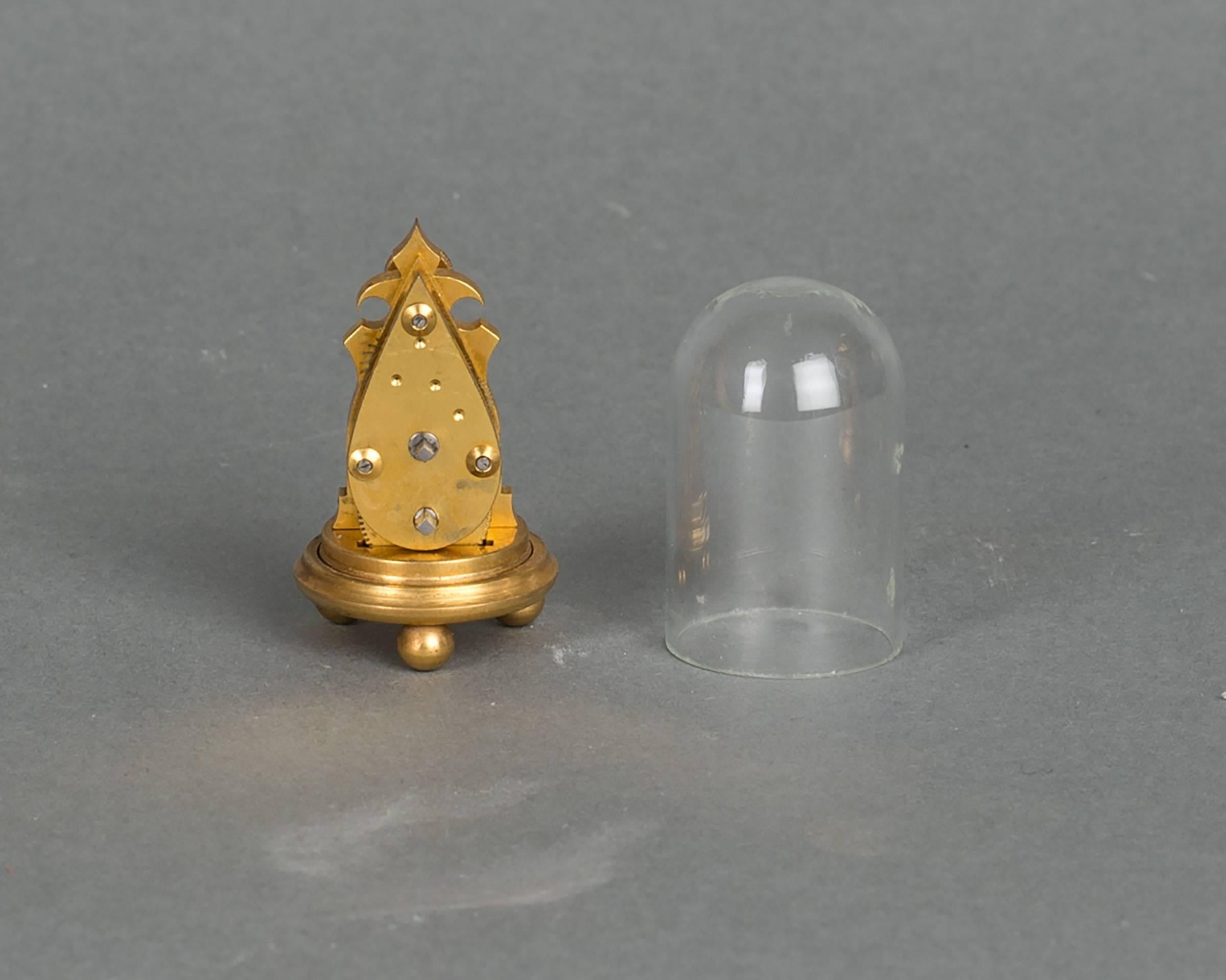 A very small and unusual Austrian ormolu zappler miniature clock with matching dome and enamel dial. This very rare time -piece clock is made in Vienna and is very collectible because of its size, circa 1860.
Measurements:
H 4.7cm including the