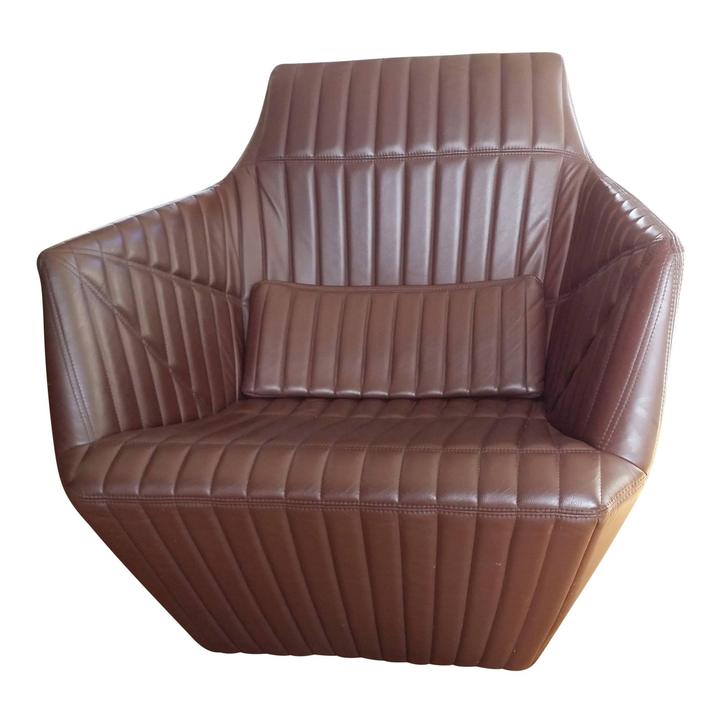 Rare über comfortable modernist armchair by Bouroullec brothers for Editions Ligne Roset.
Pristine condition.
Dark chocolate leather original upholstery
matching ottoman.

Construction: 
Three layers of criss-cross panels and thermoformed