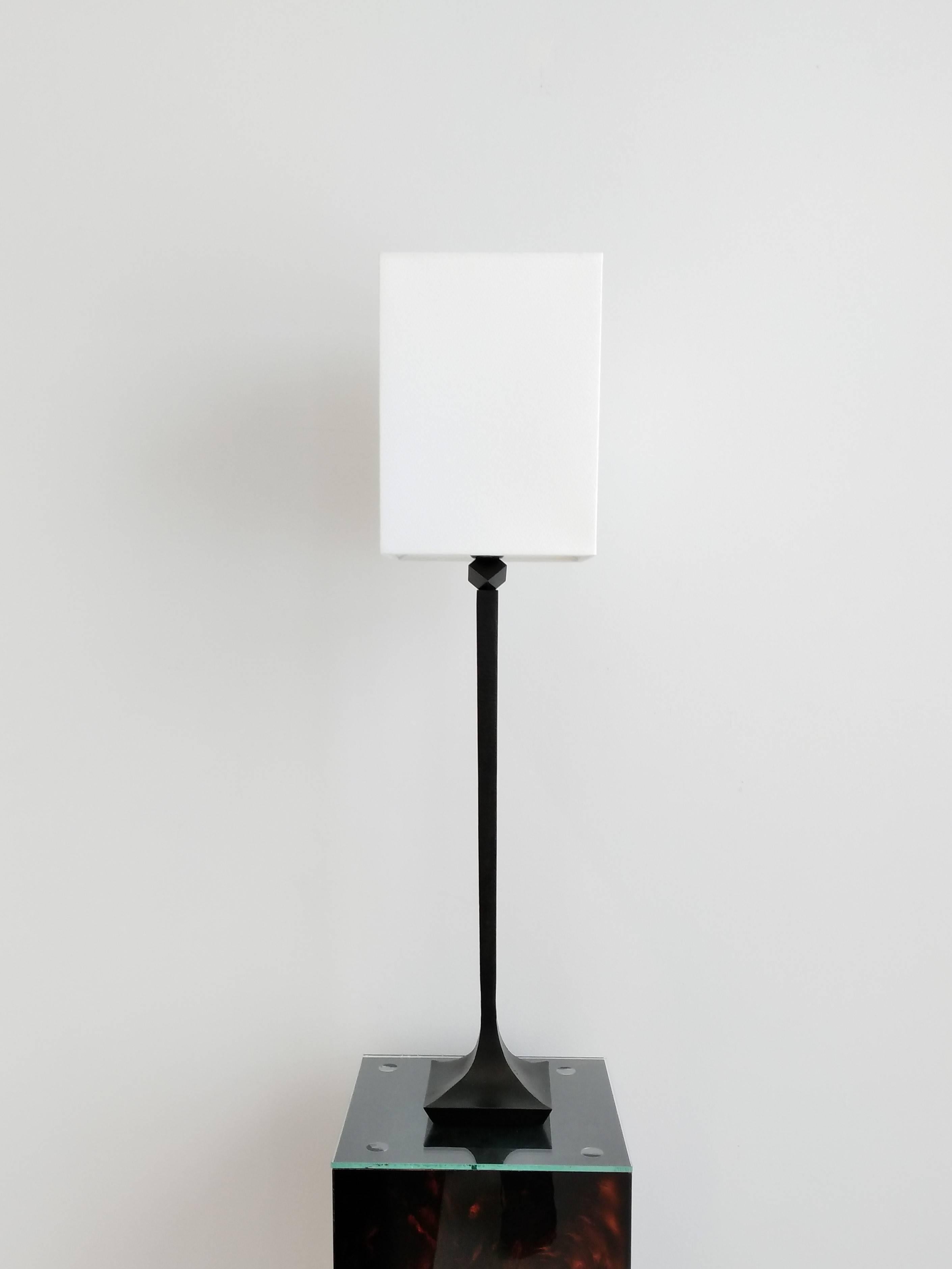 Beautifully handcrafted in Paris, France, these solid bronze table lamps were designed by RIchard Peduzzi - a set decorator who has worked extensively with director Patrice Chereau in France. RIchard Peduzzi also acted as the director of Villa
