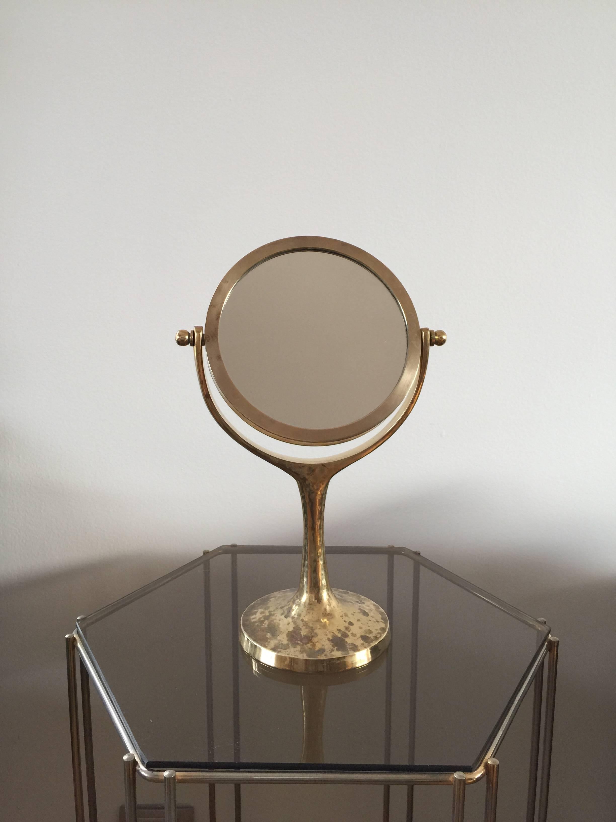 Hammered brass stand.
Beautiful patina.
Mirror on both sides.
Fully adjustable.
This item will ship from Paris.
Price does not include handling, shipping and possible customs related charges.