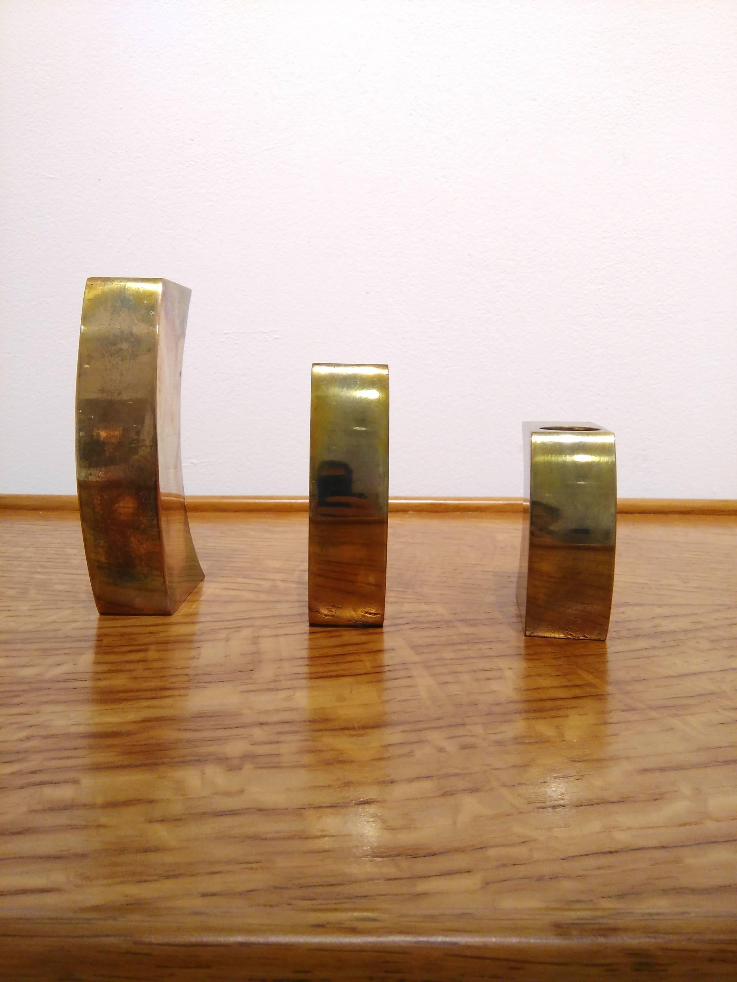 Signed Suite of Three Solid Patinated Bronze Candle Holders, France, 1970s In Good Condition In New York, NY