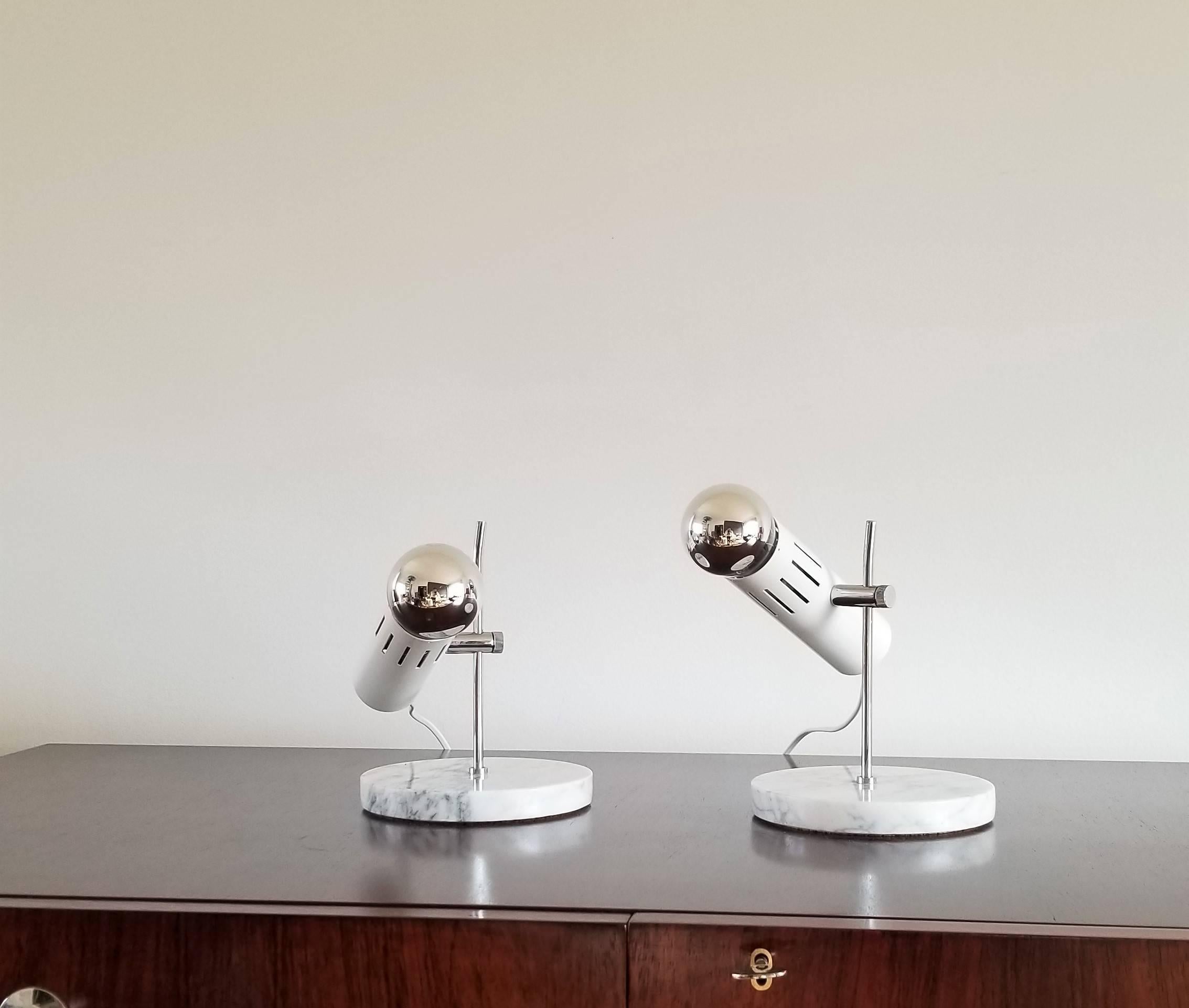 Marble, chrome and lacquered steel table lamps
Editions Disderot
France
excellent vintage condition
can be adjusted in height and can rotate around the pole
European socket and wiring
price includes rewiring for the US.
 