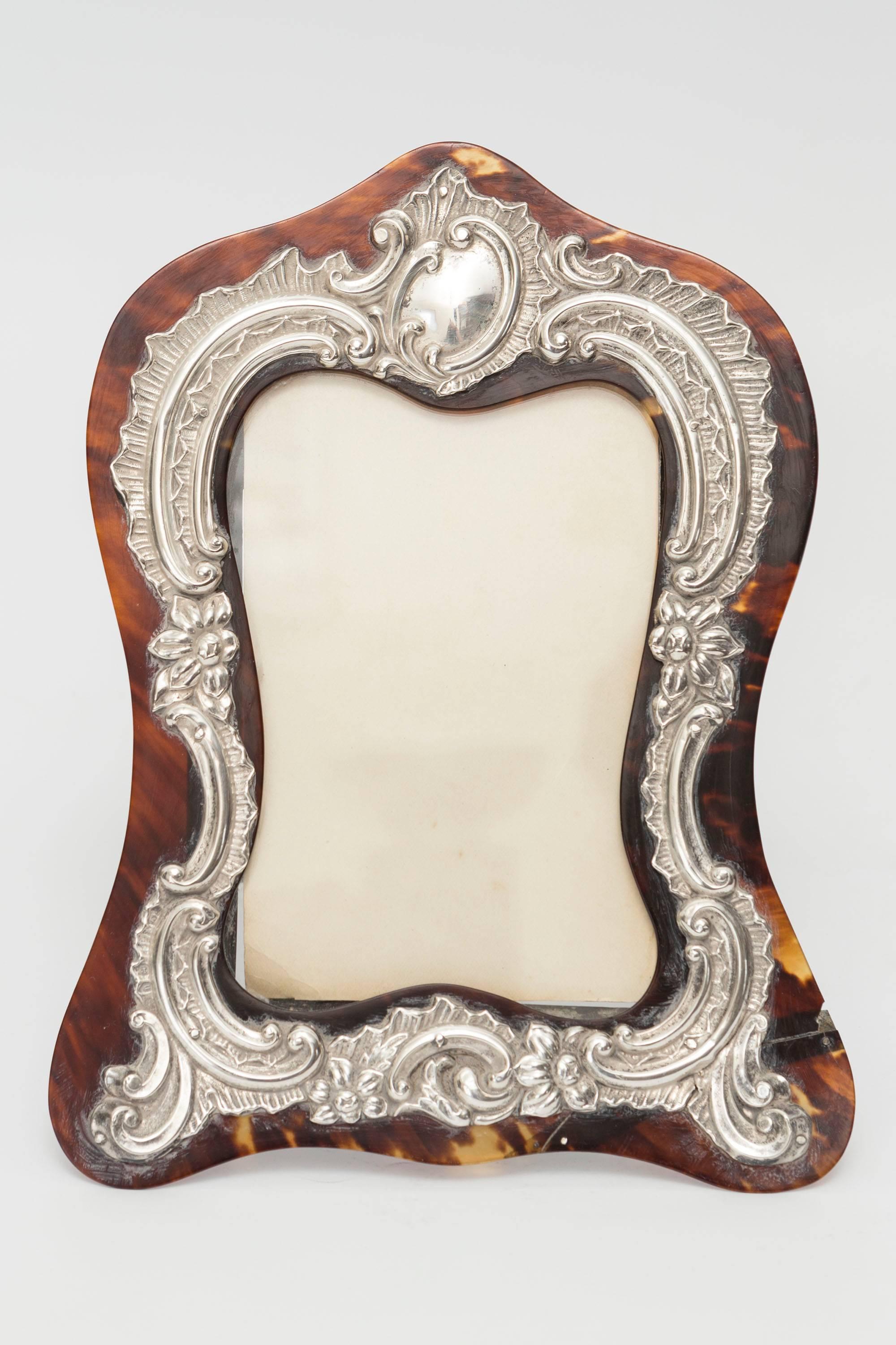 19th Century Ornate silver mounts on tortoiseshell picture frame. Fits photo size 3.5 x 5.5.