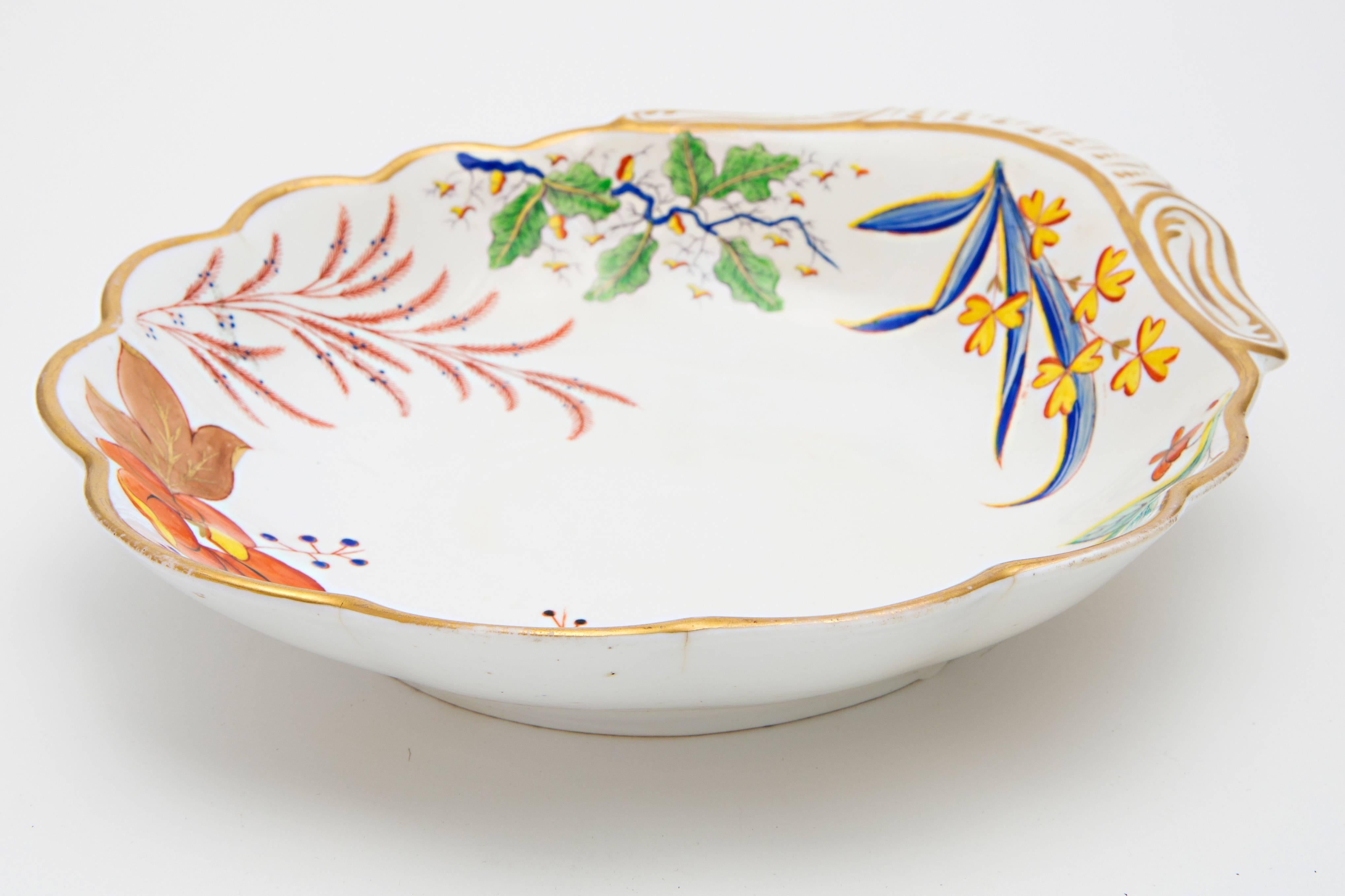 19th Century Porcelain Spode shell dish. The colors are in shades of orange, green, blue and gold.  